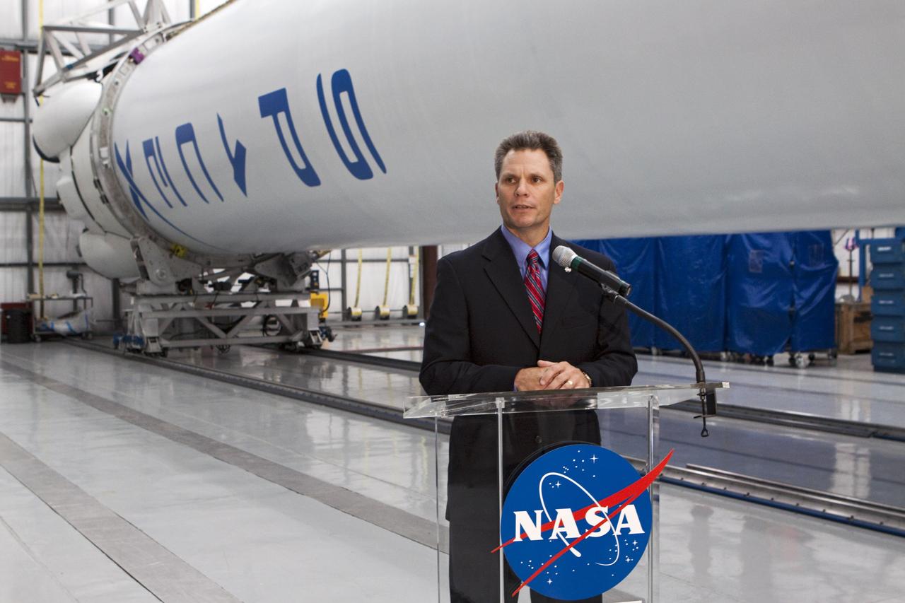 CAPE CANAVERAL, Fla. -- Inside the Space Exploration Technologies, or SpaceX, processing facility near NASA’s Kennedy Space Center in Florida, Scott Thurston, partner integration office manager with the Commercial Crew Program, talks to the media prior to an announcement from NASA Administrator Charles Bolden about new milestones in the nation’s commercial space initiatives. Bolden announced that SpaceX has completed its Space Act Agreement with NASA for Commercial Orbital Transportation Services. SpaceX is scheduled to launch the first of its 12 contracted cargo flights to the space station from Cape Canaveral this October, under NASA’s Commercial Resupply Services Program. Bolden also announced NASA partner Sierra Nevada Corp. has conducted its first milestone under the agency’s recently announced Commercial Crew Integrated Capability initiative. The milestone, a program implementation plan review, marks an important first step in Sierra Nevada’s efforts to develop a crew transportation system with its Dream Chaser spacecraft. Through NASA’s commercial space initiatives and programs, the agency is providing investments to stimulate the American commercial space industry. Photo credit: NASA/Kim Shiflett