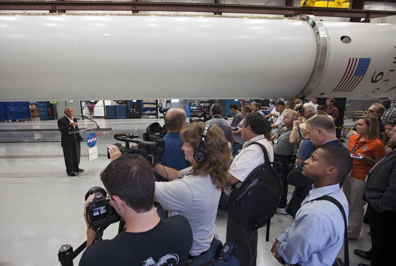 CAPE CANAVERAL, Fla. -- Inside the Space Exploration Technologies, or SpaceX, processing facility near NASA’s Kennedy Space Center in Florida, NASA Administrator Charlie Bolden announced new milestones in the nation’s commercial space initiatives. Bolden announced that SpaceX has completed its Space Act Agreement with NASA for Commercial Orbital Transportation Services. SpaceX is scheduled to launch the first of its 12 contracted cargo flights to the space station from Cape Canaveral this October, under NASA’s Commercial Resupply Services Program. Bolden also announced NASA partner Sierra Nevada Corp. has conducted its first milestone under the agency’s recently announced Commercial Crew Integrated Capability initiative. The milestone, a program implementation plan review, marks an important first step in Sierra Nevada’s efforts to develop a crew transportation system with its Dream Chaser spacecraft. Through NASA’s commercial space initiatives and programs, the agency is providing investments to stimulate the American commercial space industry. Photo credit: NASA/Kim Shiflett