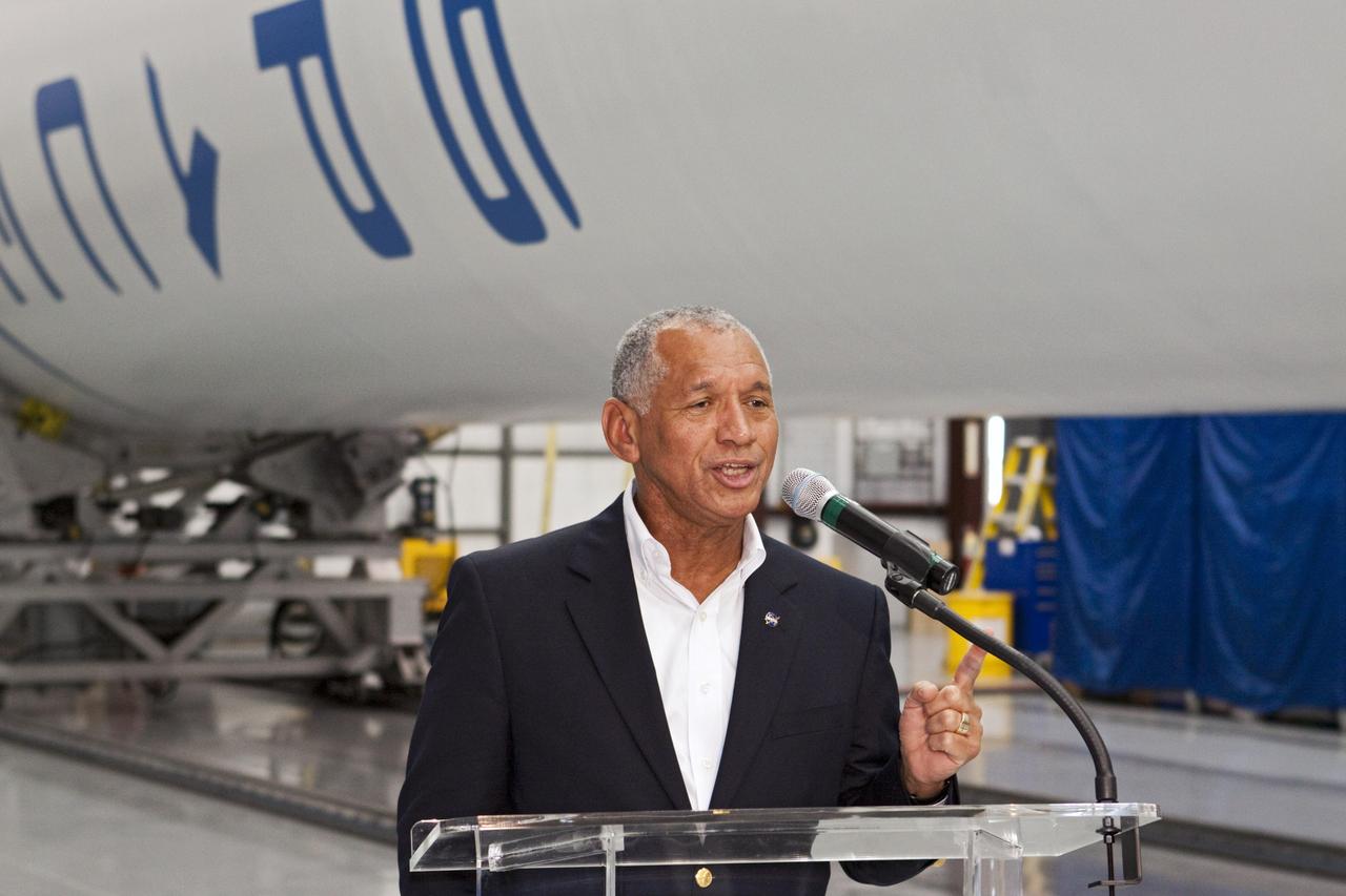 CAPE CANAVERAL, Fla. -- Inside the Space Exploration Technologies, or SpaceX, processing facility near NASA’s Kennedy Space Center in Florida, NASA Administrator Charlie Bolden announced new milestones in the nation’s commercial space initiatives. Bolden announced that SpaceX has completed its Space Act Agreement with NASA for Commercial Orbital Transportation Services. SpaceX is scheduled to launch the first of its 12 contracted cargo flights to the space station from Cape Canaveral this October, under NASA’s Commercial Resupply Services Program. Bolden also announced NASA partner Sierra Nevada Corp. has conducted its first milestone under the agency’s recently announced Commercial Crew Integrated Capability initiative. The milestone, a program implementation plan review, marks an important first step in Sierra Nevada’s efforts to develop a crew transportation system with its Dream Chaser spacecraft. Through NASA’s commercial space initiatives and programs, the agency is providing investments to stimulate the American commercial space industry. Photo credit: NASA/Kim Shiflett