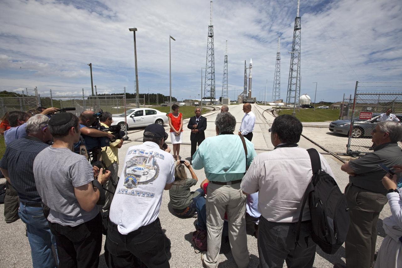 CAPE CANAVERAL, Fla. - NASA Administrator Charles Bolden, second from the left, addresses news media at Space Launch Complex-41 at Cape Canaveral Air Force Station in Florida. At the pad, a United Launch Alliance, or ULA, Atlas V rocket is being prepared for launch of the Radiation Belt Storm Probes, or RBSP, satellites. Speaking to members of the media are, from the left, Dr. Nicky Fox, deputy RBSP project scientist for the Applied Physics Laboratory at Johns Hopkins University, Bolden, James Sponnick, ULA vice president of Mission Operations and NASA Chief Scientist Waleed Abdalati.      Bolden took a few dozen members of the news media on a tour of the space agency's Kennedy Space Center and adjacent Cape Canaveral Air Force Station on Aug. 23, 2012 to show the progress being made for future government and commercial space endeavors that will begin from Florida's Space Coast. For more information, visit: http://www.nasa.gov/centers/kennedy/news/kennedy-bolden-tour.html Photo credit: NASA/Kim Shiflett