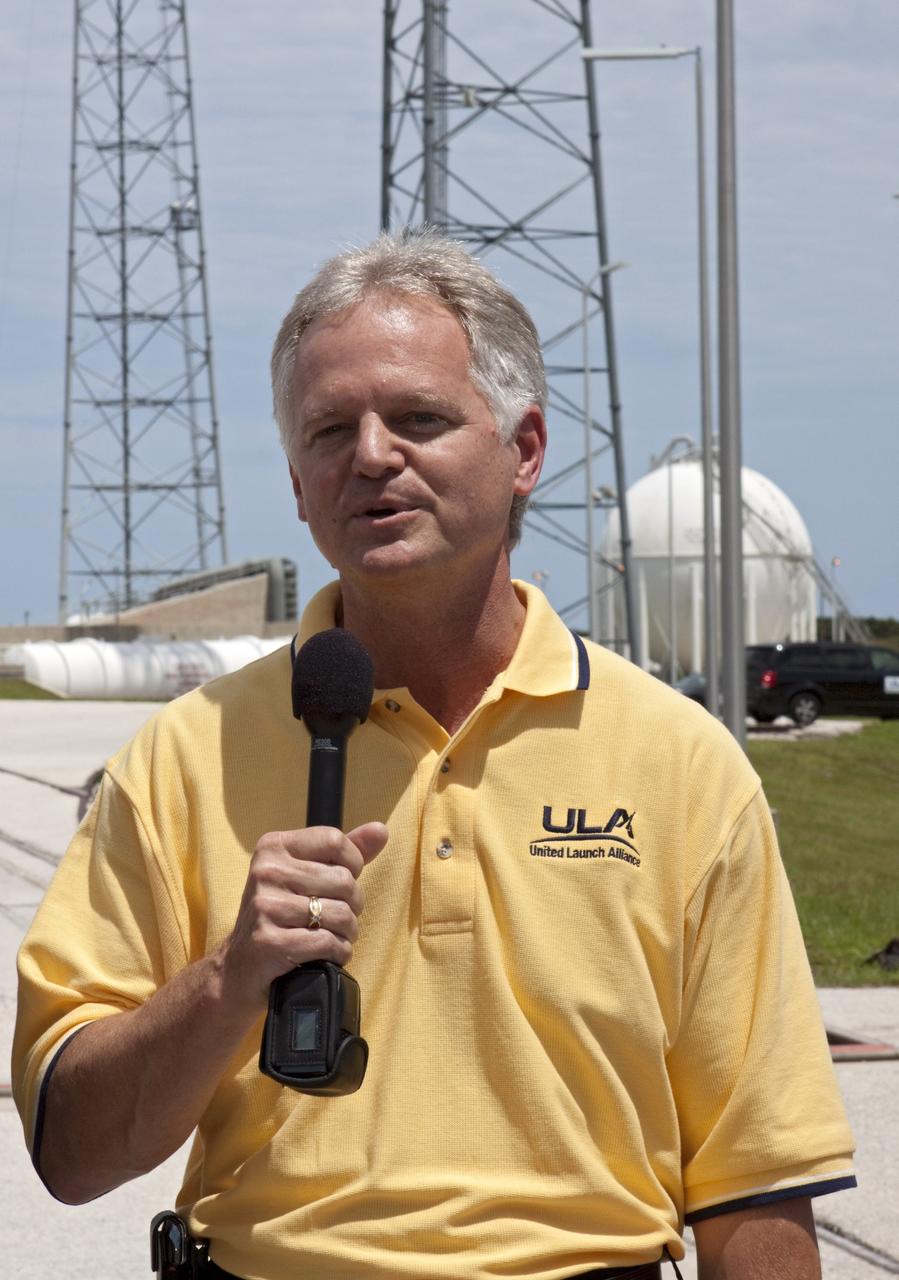 CAPE CANAVERAL, Fla. - United Launch Alliance, or ULA, Vice President of Mission Operations James Sponnick addresses news media at Space Launch Complex-41 at Cape Canaveral Air Force Station in Florida. At the pad, a ULA Atlas V rocket is being prepared for launch of the Radiation Belt Storm Probes, or RBSP, satellites. The presentation took place during NASA Administrator Charles Bolden's tour of the facility. Bolden took a few dozen members of the news media on a tour of the space agency's Kennedy Space Center and adjacent Cape Canaveral Air Force Station on Aug. 23, 2012 to show the progress being made for future government and commercial space endeavors that will begin from Florida's Space Coast. For more information, visit: http://www.nasa.gov/centers/kennedy/news/kennedy-bolden-tour.html Photo credit: NASA/Kim Shiflett