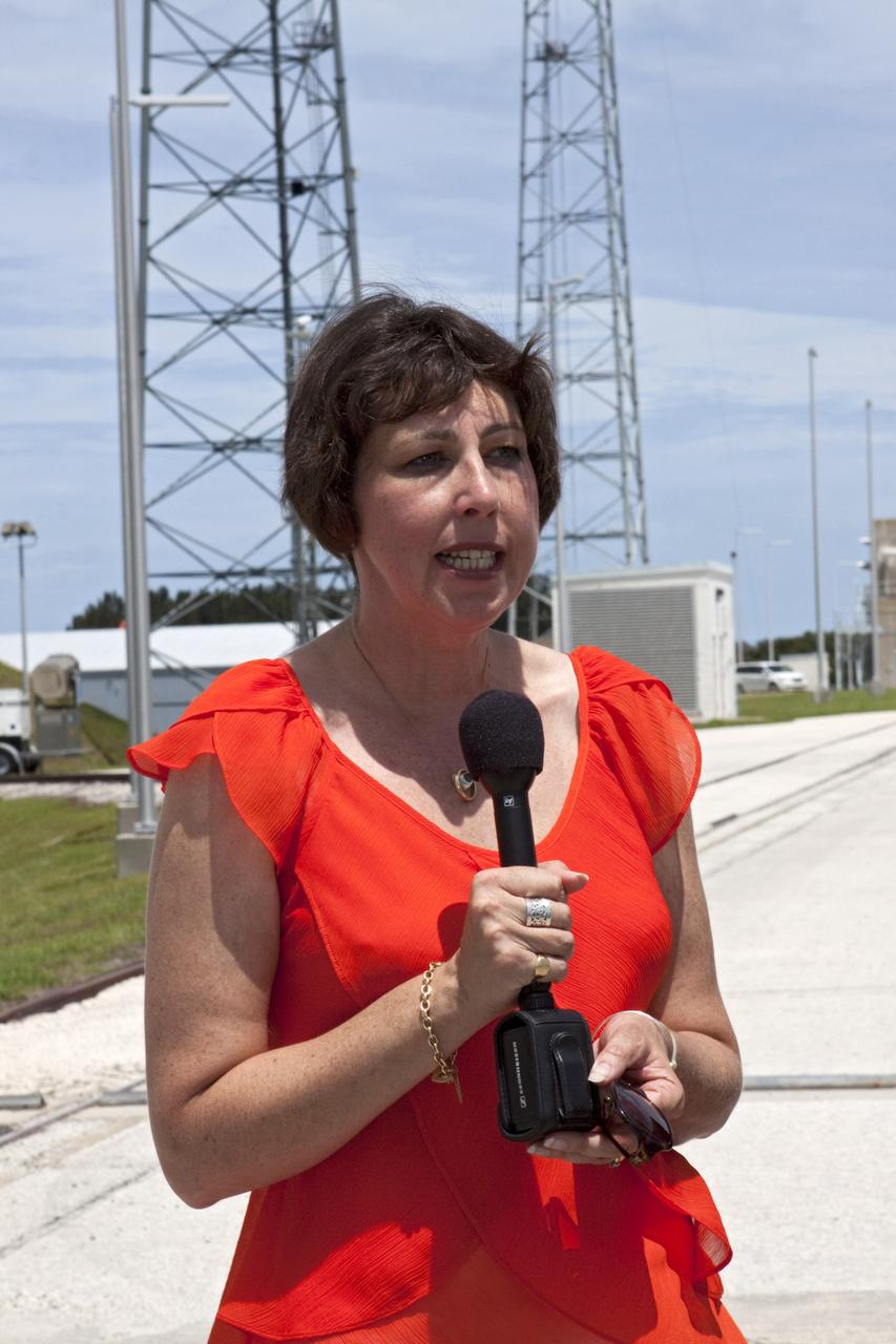 CAPE CANAVERAL, Fla. - Dr. Nicky Fox, deputy RBSP project scientist for the Applied Physics Laboratory at Johns Hopkins University, addresses news media at Space Launch Complex-41 at Cape Canaveral Air Force Station in Florida. At the pad, a United Launch Alliance, or ULA, Atlas V rocket is being prepared for launch of the Radiation Belt Storm Probes, or RBSP, satellites. The presentation took place during NASA Administrator Charles Bolden's tour of the facility.      Bolden took a few dozen members of the news media on a tour of the space agency's Kennedy Space Center and adjacent Cape Canaveral Air Force Station on Aug. 23, 2012 to show the progress being made for future government and commercial space endeavors that will begin from Florida's Space Coast. For more information, visit: http://www.nasa.gov/centers/kennedy/news/kennedy-bolden-tour.html Photo credit: NASA/Kim Shiflett