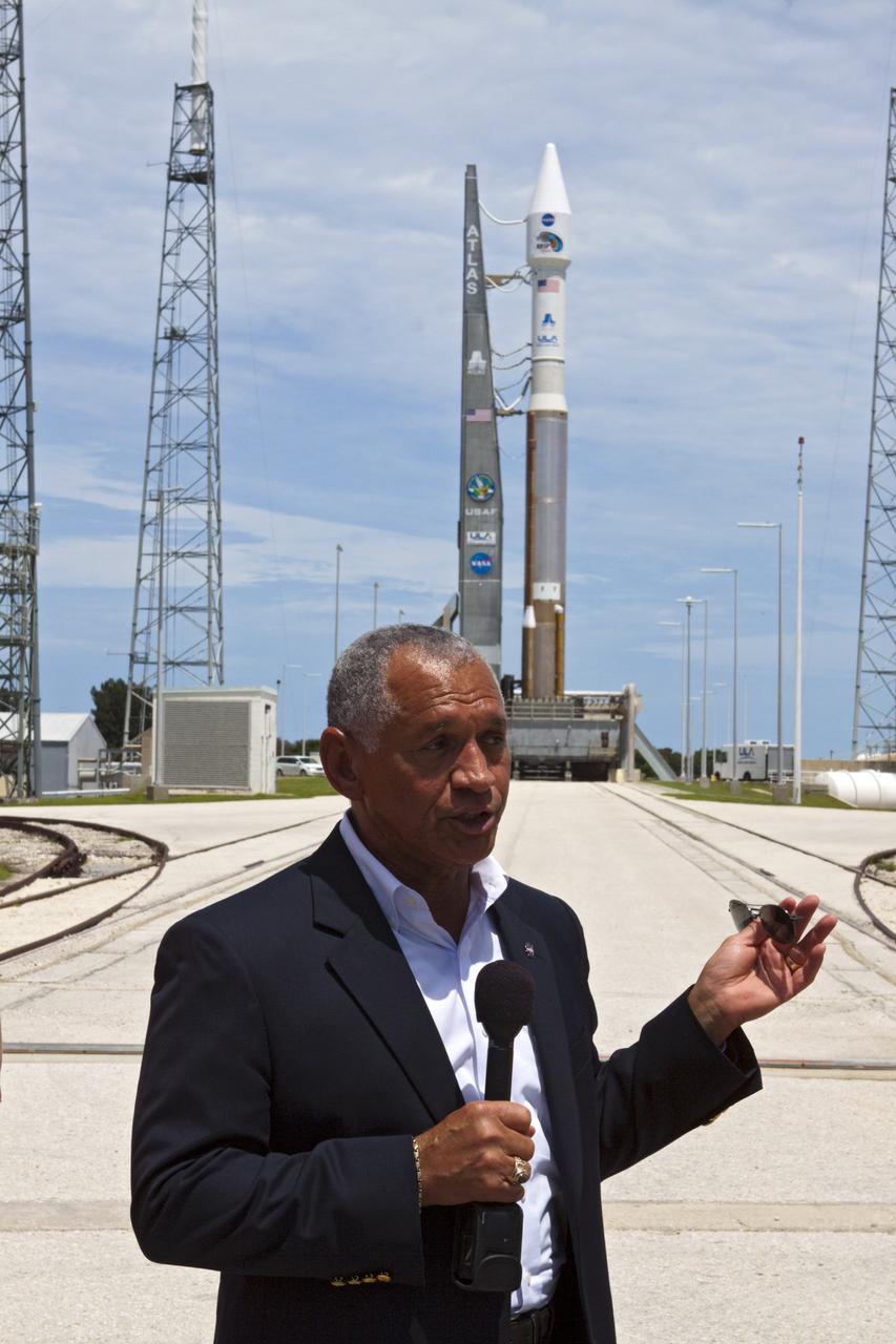 CAPE CANAVERAL, Fla. - NASA Administrator Charles Bolden, second from the left, addresses news media in Space Launch Complex-41 at Cape Canaveral Air Force Station in Florida. At the pad, a United Launch Alliance, or ULA, Atlas V rocket is being prepared for launch of the Radiation Belt Storm Probes, or RBSP, satellites. The presentation took place during NASA Administrator Charles Bolden's tour of the facility. Bolden took a few dozen members of the news media on a tour of the space agency's Kennedy Space Center and adjacent Cape Canaveral Air Force Station on Aug. 23, 2012 to show the progress being made for future government and commercial space endeavors that will begin from Florida's Space Coast. For more information, visit: http://www.nasa.gov/centers/kennedy/news/kennedy-bolden-tour.html Photo credit: NASA/Kim Shiflett