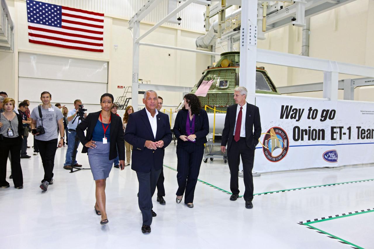 CAPE CANAVERAL, Fla. - NASA Administrator Charles Bolden tours the Operations and Checkout, or O& C, Building at the Kennedy Space Center in Florida. In the O&C, the Orion EFT-1 spacecraft is being prepared for the program's first flight. Bolden took a few dozen members of the news media on a tour of the space agency's Kennedy Space Center and adjacent Cape Canaveral Air Force Station on Aug. 23, 2012 to show the progress being made for future government and commercial space endeavors that will begin from Florida's Space Coast. For more information, visit: http://www.nasa.gov/centers/kennedy/news/kennedy-bolden-tour.html Photo credit: NASA/Kim Shiflett