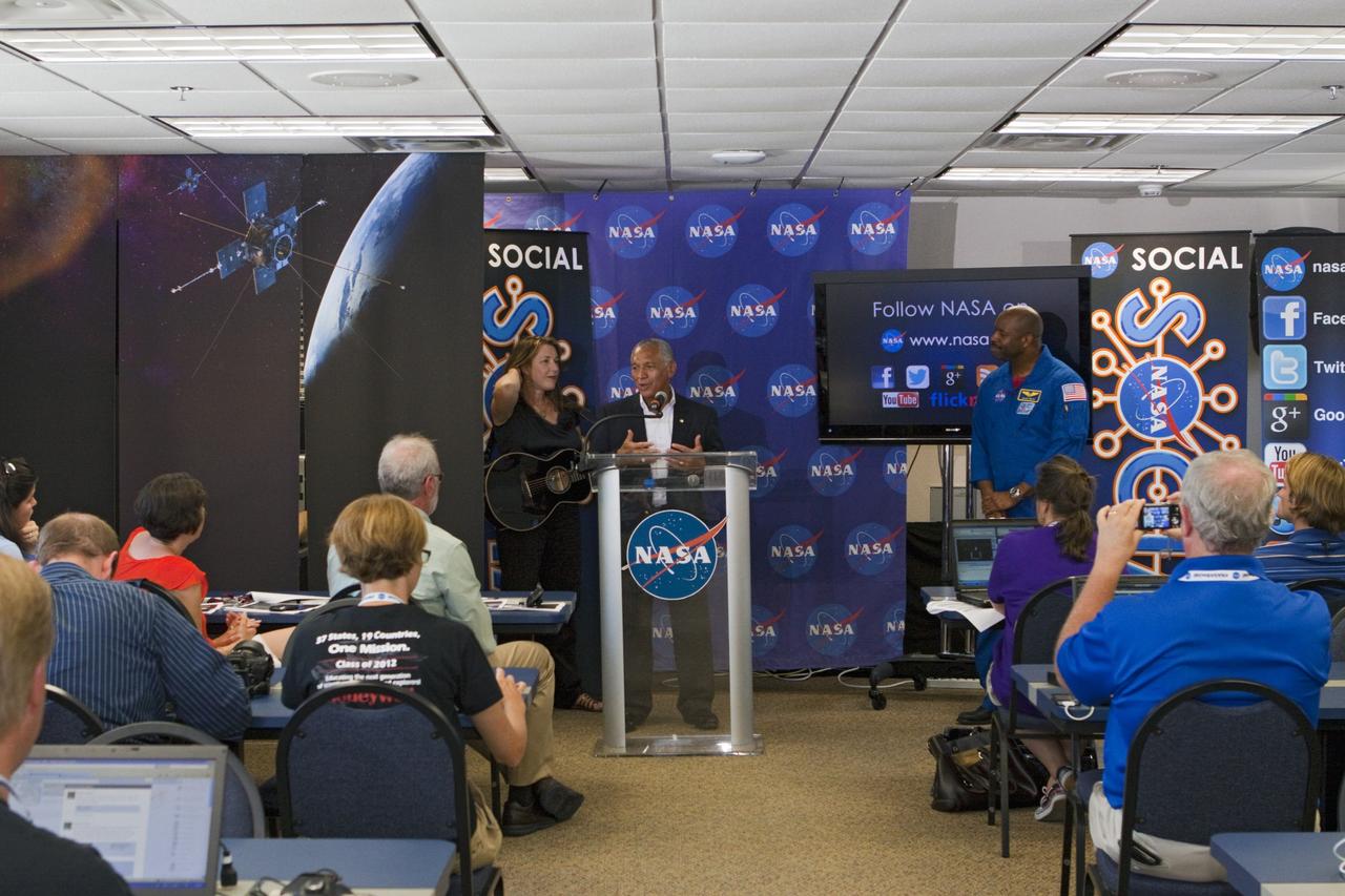 CAPE CANAVERAL, Fla. – At NASA's Kennedy Space Center in Florida, NASA Administrator Charlie Bolden talks to agency social media followers during the second day of NASA Social activities revolving around the agency's Radiation Belt Storm Probes, or RBSP, mission. At left is performer Beth Nielson Chapman. At right is astronaut Leland Melvin, associate administrator of NASA Education. The probes are set to launch aboard a United Launch Alliance, or ULA, Atlas V rocket from nearby Cape Canaveral Air Force Station. About 40 followers were selected to participate in RBSP's prelaunch and launch activities. The RBSP mission will help us understand the sun’s influence on Earth and near-Earth space by studying the Earth’s radiation belts on various scales of space and time. RBSP will begin its mission of exploration of Earth’s Van Allen radiation belts and the extremes of space weather. For more information, visit http://www.nasa.gov/rbsp. Photo credit: NASA/Kim Shiflett
