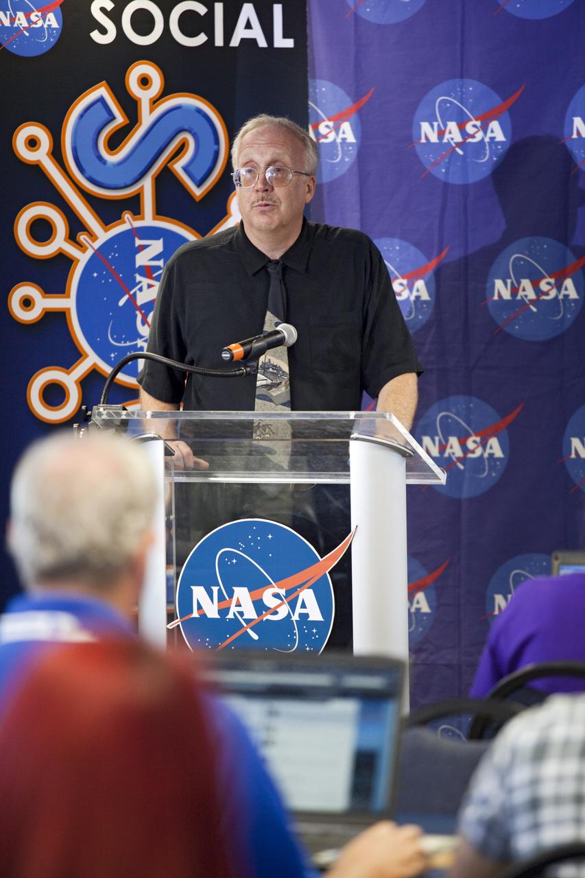 CAPE CANAVERAL, Fla. – At NASA's Kennedy Space Center in Florida, David Sibeck, NASA Living with a Star mission scientist from Goddard Space Flight Center, talks to agency social media followers during the second day of NASA Social activities revolving around NASA's Radiation Belt Storm Probes, or RBSP, mission. The probes are set to launch aboard a United Launch Alliance, or ULA, Atlas V rocket from nearby Cape Canaveral Air Force Station. About 40 followers were selected to participate in RBSP's prelaunch and launch activities. The RBSP mission will help us understand the sun’s influence on Earth and near-Earth space by studying the Earth’s radiation belts on various scales of space and time. RBSP will begin its mission of exploration of Earth’s Van Allen radiation belts and the extremes of space weather. For more information, visit http://www.nasa.gov/rbsp. Photo credit: NASA/Frankie Martin