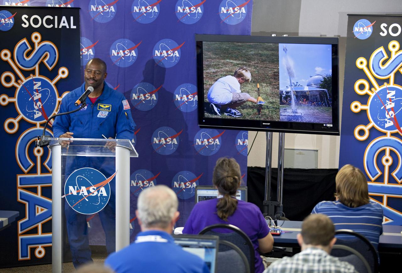CAPE CANAVERAL, Fla. – At NASA's Kennedy Space Center in Florida, astronaut Leland Melvin, associate administrator of NASA Education, talks to agency social media followers during the second day of NASA Social activities revolving around NASA's Radiation Belt Storm Probes, or RBSP, mission. The probes are set to launch aboard a United Launch Alliance, or ULA, Atlas V rocket from nearby Cape Canaveral Air Force Station. About 40 followers were selected to participate in RBSP's prelaunch and launch activities. The RBSP mission will help us understand the sun’s influence on Earth and near-Earth space by studying the Earth’s radiation belts on various scales of space and time. RBSP will begin its mission of exploration of Earth’s Van Allen radiation belts and the extremes of space weather. For more information, visit http://www.nasa.gov/rbsp. Photo credit: NASA/Frankie Martin