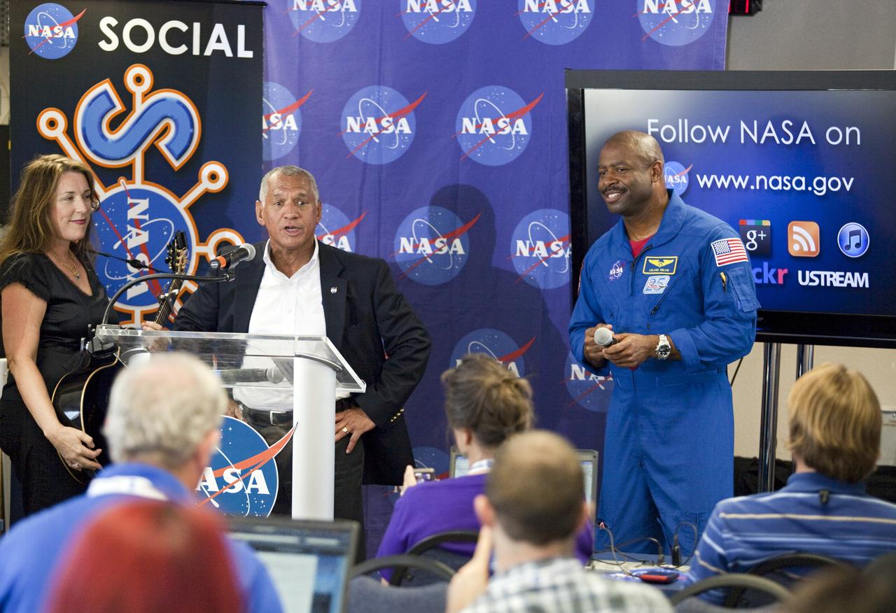 CAPE CANAVERAL, Fla. – At NASA's Kennedy Space Center in Florida, NASA Administrator Charlie Bolden talks to agency social media followers during the second day of NASA Social activities revolving around NASA's Radiation Belt Storm Probes, or RBSP, mission. At left is performer Beth Nielson Chapman. At right is astronaut Leland Melvin, associate administrator of NASA Education. The probes are set to launch aboard a United Launch Alliance, or ULA, Atlas V rocket from nearby Cape Canaveral Air Force Station. About 40 followers were selected to participate in RBSP's prelaunch and launch activities. The RBSP mission will help us understand the sun’s influence on Earth and near-Earth space by studying the Earth’s radiation belts on various scales of space and time. RBSP will begin its mission of exploration of Earth’s Van Allen radiation belts and the extremes of space weather. For more information, visit http://www.nasa.gov/rbsp. Photo credit: NASA/Frankie Martin