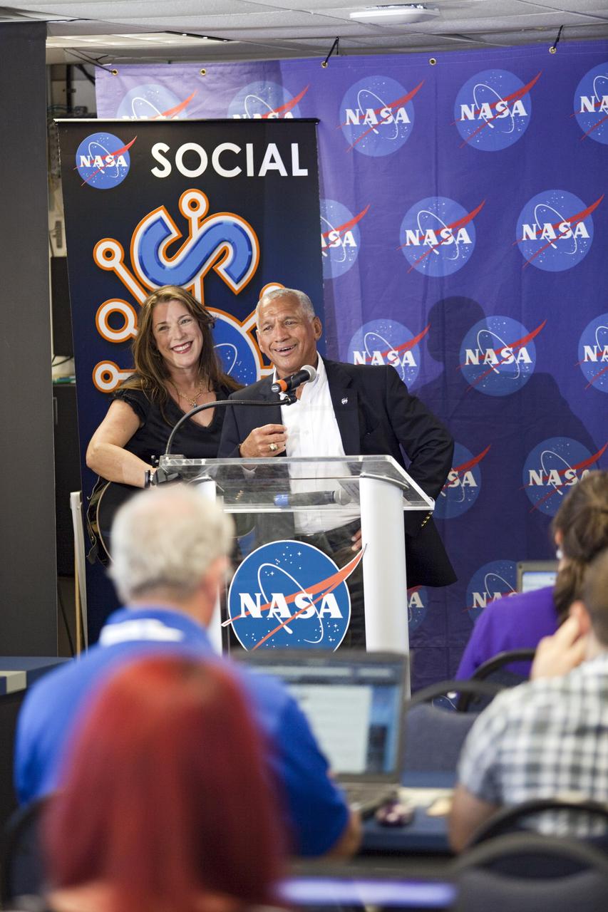 CAPE CANAVERAL, Fla. – At NASA's Kennedy Space Center in Florida, NASA Administrator Charlie Bolden talks to agency social media followers during the second day of NASA Social activities revolving around NASA's Radiation Belt Storm Probes, or RBSP, mission. At left is performer Beth Nielson Chapman. The probes are set to launch aboard a United Launch Alliance, or ULA, Atlas V rocket from nearby Cape Canaveral Air Force Station. About 40 followers were selected to participate in RBSP's prelaunch and launch activities. The RBSP mission will help us understand the sun’s influence on Earth and near-Earth space by studying the Earth’s radiation belts on various scales of space and time. RBSP will begin its mission of exploration of Earth’s Van Allen radiation belts and the extremes of space weather. For more information, visit http://www.nasa.gov/rbsp. Photo credit: NASA/Frankie Martin