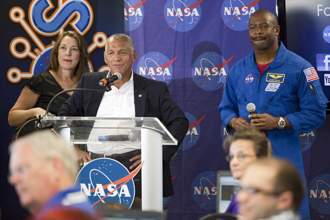 CAPE CANAVERAL, Fla. – At NASA's Kennedy Space Center in Florida, NASA Administrator Charlie Bolden talks to agency social media followers during the second day of NASA Social activities revolving around NASA's Radiation Belt Storm Probes, or RBSP, mission. At left is performer Beth Nielson Chapman. At right is astronaut Leland Melvin, associate administrator of NASA Education. The probes are set to launch aboard a United Launch Alliance, or ULA, Atlas V rocket from nearby Cape Canaveral Air Force Station. About 40 followers were selected to participate in RBSP's prelaunch and launch activities. The RBSP mission will help us understand the sun’s influence on Earth and near-Earth space by studying the Earth’s radiation belts on various scales of space and time. RBSP will begin its mission of exploration of Earth’s Van Allen radiation belts and the extremes of space weather. For more information, visit http://www.nasa.gov/rbsp. Photo credit: NASA/Frankie Martin