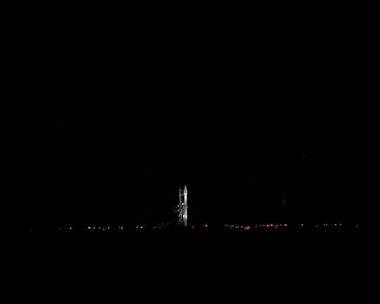 CAPE CANAVERAL, Fla. – Weather conditions associated with lightning, as well as cumulus and anvil clouds, kept NASA's Radiation Belt Storm Probes, or RBSP, on Space Launch Complex 41 at Cape Canaveral Air Force Station in Florida. The twin probes are awaiting launch atop a United Launch Alliance Atlas V rocket. RBSP will explore changes in Earth's space environment caused by the sun -- known as "space weather" -- that can disable satellites, create power-grid failures and disrupt GPS service. The mission also will provide data on the fundamental radiation and particle acceleration processes throughout the universe. The launch is rescheduled for 4:05 a.m. EDT on Aug. 30, pending approval from the range. For more information on RBSP, visit http://www.nasa.gov/rbsp. Photo credit: NASA/Gary Thompson