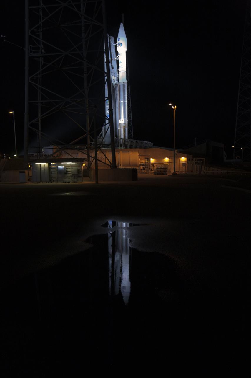 CAPE CANAVERAL, Fla. – An unfavorable weather forecast as a result of Tropical Storm Isaac approaching Florida kept NASA's twin Radiation Belt Storm Probes, or RBSP, on Space Launch Complex 41 at Cape Canaveral Air Force Station in Florida. Managers decided to roll the Atlas V rocket off the launch pad and back to the Vertical Integration Facility to ensure the launch vehicle and RBSP spacecraft are secured and protected from inclement weather.    RBSP will explore changes in Earth's space environment caused by the sun -- known as "space weather" -- that can disable satellites, create power-grid failures and disrupt GPS service. The mission also will provide data on the fundamental radiation and particle acceleration processes throughout the universe. The launch is rescheduled for 4:05 a.m. EDT on Aug. 30, pending approval from the range.  For more information on RBSP, visit http://www.nasa.gov/rbsp.  Photo credit: NASA/Ben Smegelsky