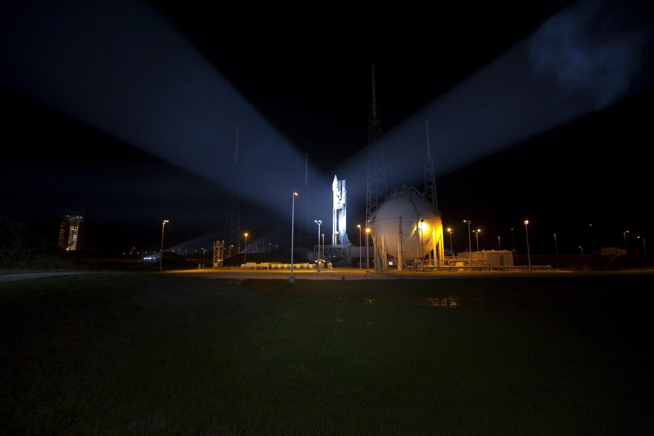 CAPE CANAVERAL, Fla. – An unfavorable weather forecast as a result of Tropical Storm Isaac approaching Florida kept NASA's twin Radiation Belt Storm Probes, or RBSP, on Space Launch Complex 41 at Cape Canaveral Air Force Station in Florida. Managers decided to roll the Atlas V rocket off the launch pad and back to the Vertical Integration Facility to ensure the launch vehicle and RBSP spacecraft are secured and protected from inclement weather.    RBSP will explore changes in Earth's space environment caused by the sun -- known as "space weather" -- that can disable satellites, create power-grid failures and disrupt GPS service. The mission also will provide data on the fundamental radiation and particle acceleration processes throughout the universe. The launch is rescheduled for 4:05 a.m. EDT on Aug. 30, pending approval from the range.  For more information on RBSP, visit http://www.nasa.gov/rbsp.  Photo credit: NASA/Ben Smegelsky