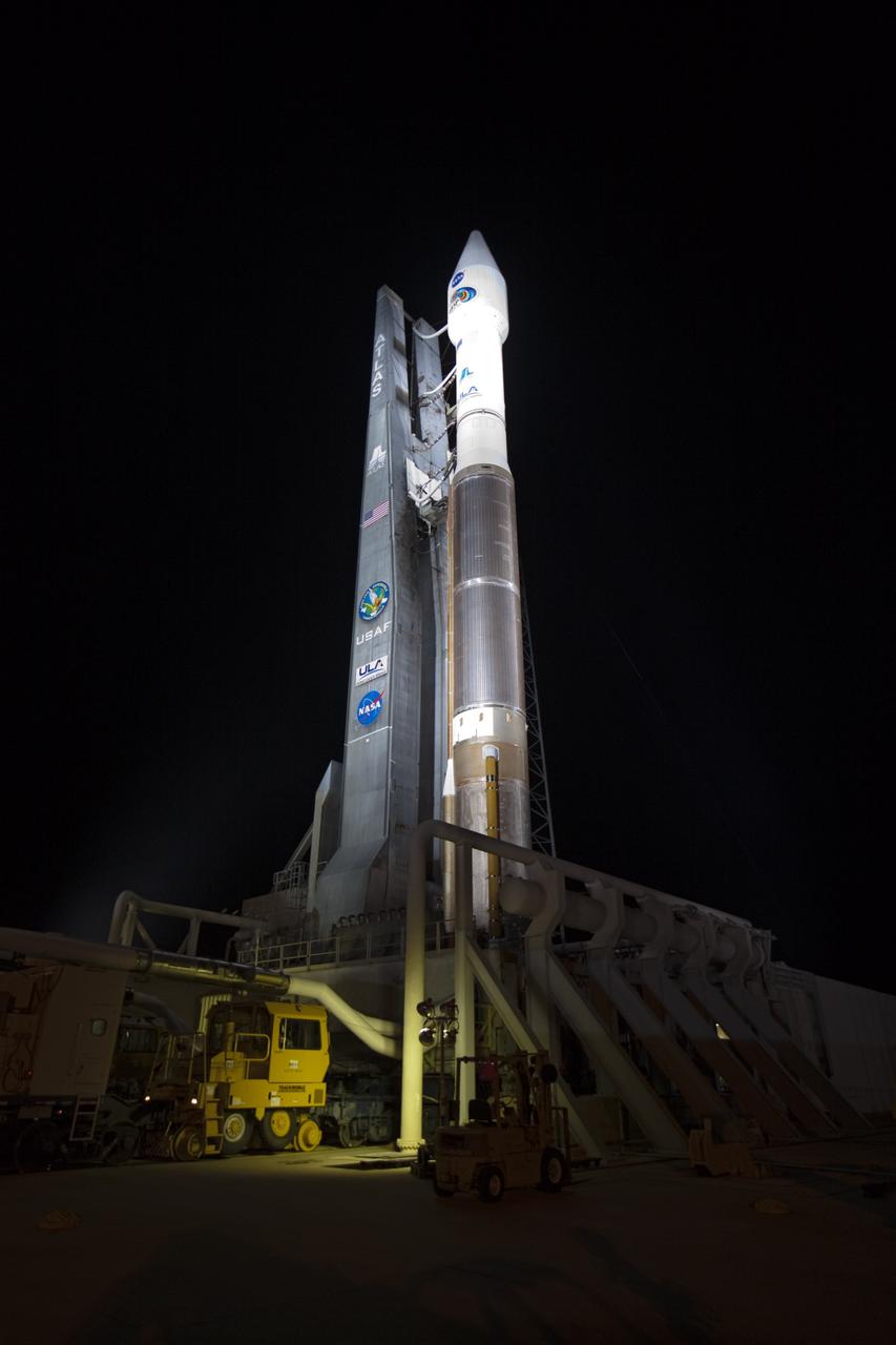 CAPE CANAVERAL, Fla. – An unfavorable weather forecast as a result of Tropical Storm Isaac approaching Florida kept NASA's twin Radiation Belt Storm Probes, or RBSP, on Space Launch Complex 41 at Cape Canaveral Air Force Station in Florida. Managers decided to roll the Atlas V rocket off the launch pad and back to the Vertical Integration Facility to ensure the launch vehicle and RBSP spacecraft are secured and protected from inclement weather.    RBSP will explore changes in Earth's space environment caused by the sun -- known as "space weather" -- that can disable satellites, create power-grid failures and disrupt GPS service. The mission also will provide data on the fundamental radiation and particle acceleration processes throughout the universe. The launch is rescheduled for 4:05 a.m. EDT on Aug. 30, pending approval from the range.  For more information on RBSP, visit http://www.nasa.gov/rbsp.  Photo credit: NASA/Ben Smegelsky
