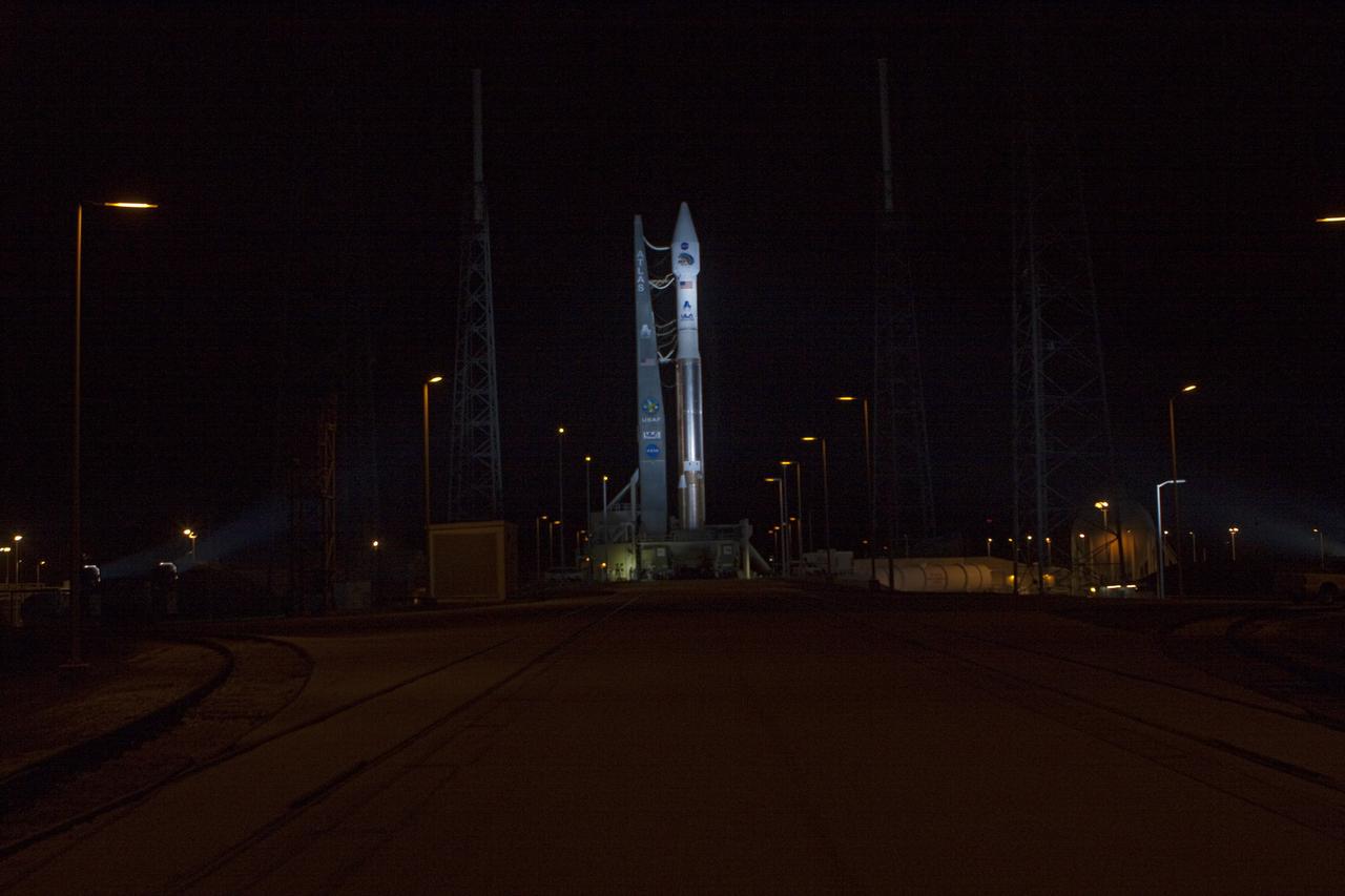 CAPE CANAVERAL, Fla. – An unfavorable weather forecast as a result of Tropical Storm Isaac approaching Florida kept NASA's twin Radiation Belt Storm Probes, or RBSP, on Space Launch Complex 41 at Cape Canaveral Air Force Station in Florida. Managers decided to roll the Atlas V rocket off the launch pad and back to the Vertical Integration Facility to ensure the launch vehicle and RBSP spacecraft are secured and protected from inclement weather.    RBSP will explore changes in Earth's space environment caused by the sun -- known as "space weather" -- that can disable satellites, create power-grid failures and disrupt GPS service. The mission also will provide data on the fundamental radiation and particle acceleration processes throughout the universe. The launch is rescheduled for 4:05 a.m. EDT on Aug. 30, pending approval from the range.  For more information on RBSP, visit http://www.nasa.gov/rbsp.  Photo credit: NASA/Ben Smegelsky