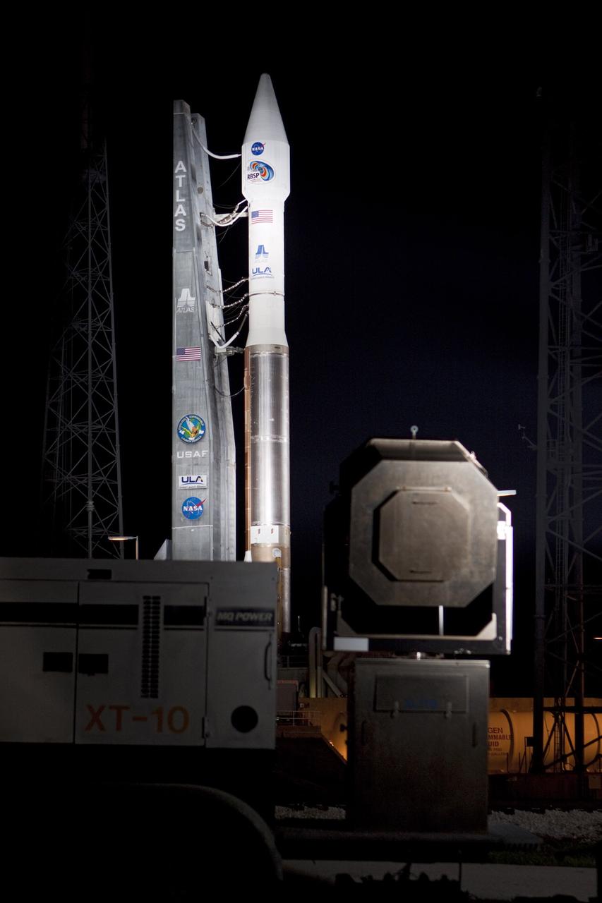 CAPE CANAVERAL, Fla. – At Cape Canaveral Air Force Station in Florida, the United Launch Alliance Atlas V rocket, carrying NASA’s twin Radiation Belt Storm Probes, or RBSP, is rolled back from Space Launch Complex 41 to the Vertical Integration Facility where they will be secured and protected from inclement weather due to Tropical Storm Isaac.    RBSP will explore changes in Earth's space environment caused by the sun -- known as "space weather" -- that can disable satellites, create power-grid failures and disrupt GPS service. The mission also will provide data on the fundamental radiation and particle acceleration processes throughout the universe. The launch is rescheduled for 4:05 a.m. EDT on Aug. 30, pending approval from the range.  For more information on RBSP, visit http://www.nasa.gov/rbsp.  Photo credit: NASA/Ben Smegelsky