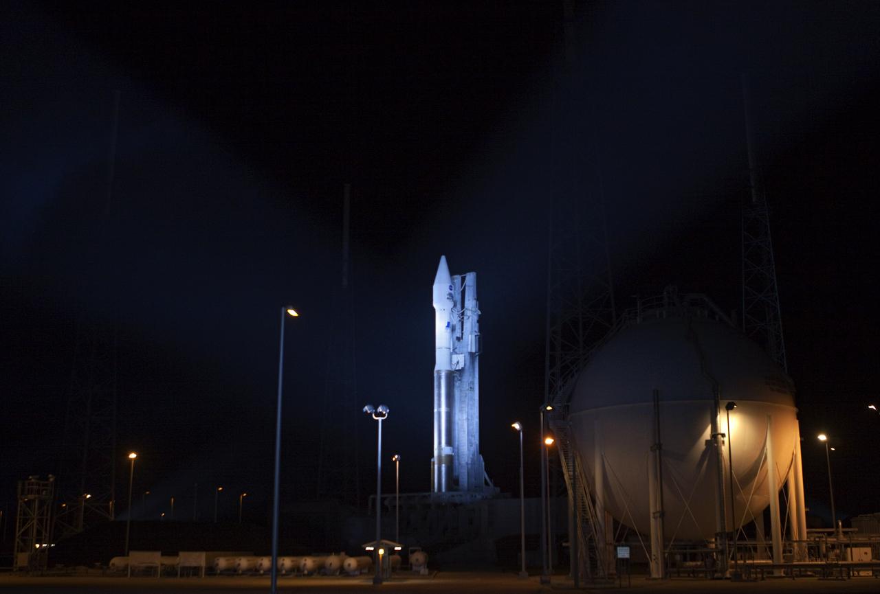 CAPE CANAVERAL, Fla. – At Cape Canaveral Air Force Station in Florida, the United Launch Alliance Atlas V rocket, carrying NASA’s twin Radiation Belt Storm Probes, or RBSP, is rolled back from Space Launch Complex 41 to the Vertical Integration Facility where they will be secured and protected from inclement weather due to Tropical Storm Isaac.    RBSP will explore changes in Earth's space environment caused by the sun -- known as "space weather" -- that can disable satellites, create power-grid failures and disrupt GPS service. The mission also will provide data on the fundamental radiation and particle acceleration processes throughout the universe. The launch is rescheduled for 4:05 a.m. EDT on Aug. 30, pending approval from the range.  For more information on RBSP, visit http://www.nasa.gov/rbsp.  Photo credit: NASA/Ben Smegelsky