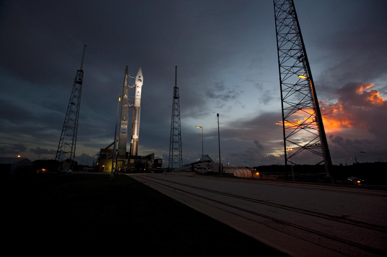 CAPE CANAVERAL, Fla. – An unfavorable weather forecast as a result of Tropical Storm Isaac approaching Florida kept NASA's twin Radiation Belt Storm Probes, or RBSP, on Space Launch Complex 41 at Cape Canaveral Air Force Station in Florida. Managers decided to roll the Atlas V rocket off the launch pad and back to the Vertical Integration Facility to ensure the launch vehicle and RBSP spacecraft are secured and protected from inclement weather.    RBSP will explore changes in Earth's space environment caused by the sun -- known as "space weather" -- that can disable satellites, create power-grid failures and disrupt GPS service. The mission also will provide data on the fundamental radiation and particle acceleration processes throughout the universe. The launch is rescheduled for 4:05 a.m. EDT on Aug. 30, pending approval from the range.  For more information on RBSP, visit http://www.nasa.gov/rbsp.  Photo credit: NASA/Ben Smegelsky