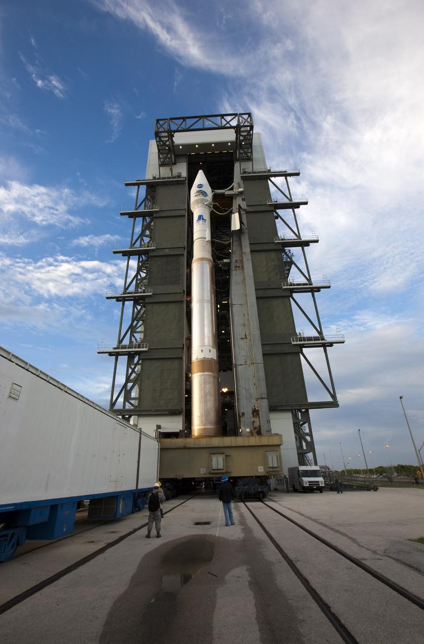 CAPE CANAVERAL, Fla. – At Cape Canaveral Air Force Station in Florida, United Launch Alliance, or ULA, technicians monitor the progress as the ULA Atlas V rocket with NASA’s twin Radiation Belt Storm Probes, or RBSP, rolls back to the Vertical Integration Facility from Space Launch Complex 41. The rocket and spacecraft will be secured and protected from inclement weather due to Tropical Storm Isaac.     RBSP will explore changes in Earth's space environment caused by the sun -- known as "space weather" -- that can disable satellites, create power-grid failures and disrupt GPS service. The mission also will provide data on the fundamental radiation and particle acceleration processes throughout the universe. The launch is rescheduled for 4:05 a.m. EDT on Aug. 30, pending approval from the range.  For more information on RBSP, visit http://www.nasa.gov/rbsp.  Photo credit: NASA/Ben Smegelsky