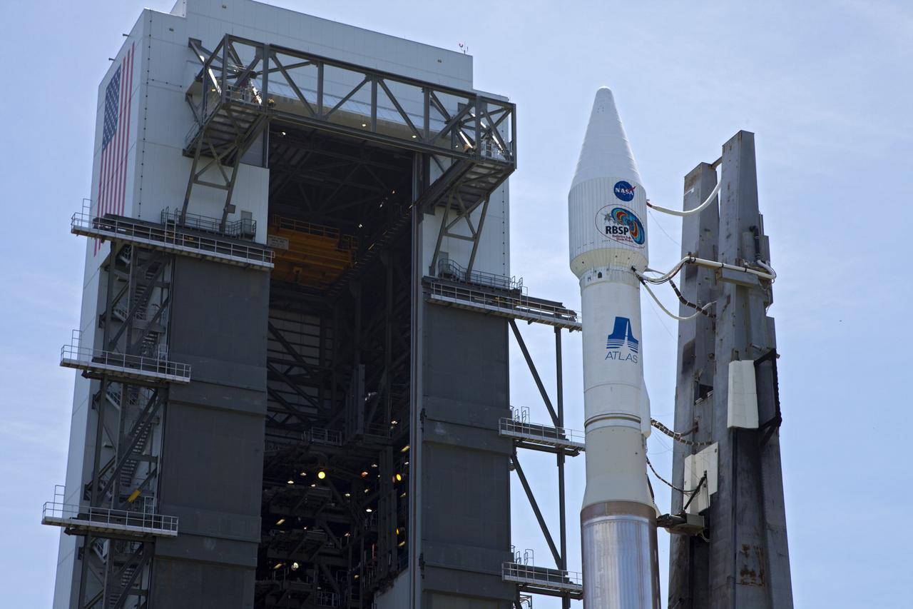 CAPE CANAVERAL, Fla. – At Cape Canaveral Air Force Station in Florida, the United Launch Alliance, or ULA, Atlas V rocket carrying NASA’s twin Radiation Belt Storm Probes, or RBSP, began rolling out of the ULA Vertical Integration Facility at Space Launch Complex 41 at 1:59 p.m. EDT heading to the launch pad. The Atlas V rocket had been rolled back to the facility on August 26 to ensure the launch vehicle and RBSP spacecraft were secured and protected from inclement weather caused by Tropical Storm Isaac.    RBSP will explore changes in Earth's space environment caused by the sun -- known as "space weather" -- that can disable satellites, create power-grid failures and disrupt GPS service. The mission also will provide data on the fundamental radiation and particle acceleration processes throughout the universe. The launch is rescheduled for 4:05 a.m. EDT on Aug. 30. For more information on RBSP, visit http://www.nasa.gov/rbsp.  Photo credit: NASA/Kim Shiflett