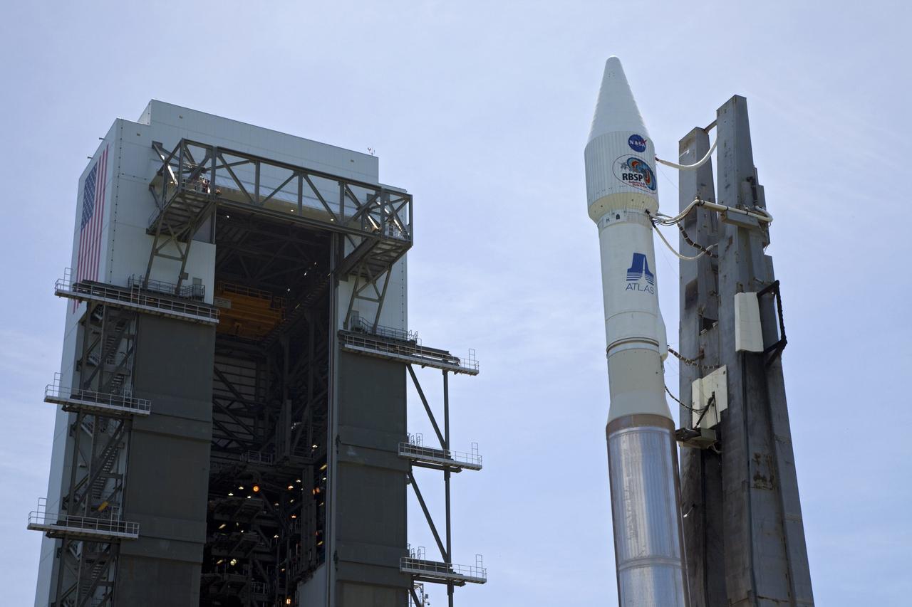 CAPE CANAVERAL, Fla. – At Cape Canaveral Air Force Station in Florida, the United Launch Alliance, or ULA, Atlas V rocket carrying NASA’s twin Radiation Belt Storm Probes, or RBSP, began rolling out of the ULA Vertical Integration Facility at Space Launch Complex 41 at 1:59 p.m. EDT heading to the launch pad. The Atlas V rocket had been rolled back to the facility on August 26 to ensure the launch vehicle and RBSP spacecraft were secured and protected from inclement weather caused by Tropical Storm Isaac.    RBSP will explore changes in Earth's space environment caused by the sun -- known as "space weather" -- that can disable satellites, create power-grid failures and disrupt GPS service. The mission also will provide data on the fundamental radiation and particle acceleration processes throughout the universe. The launch is rescheduled for 4:05 a.m. EDT on Aug. 30. For more information on RBSP, visit http://www.nasa.gov/rbsp.  Photo credit: NASA/Kim Shiflett