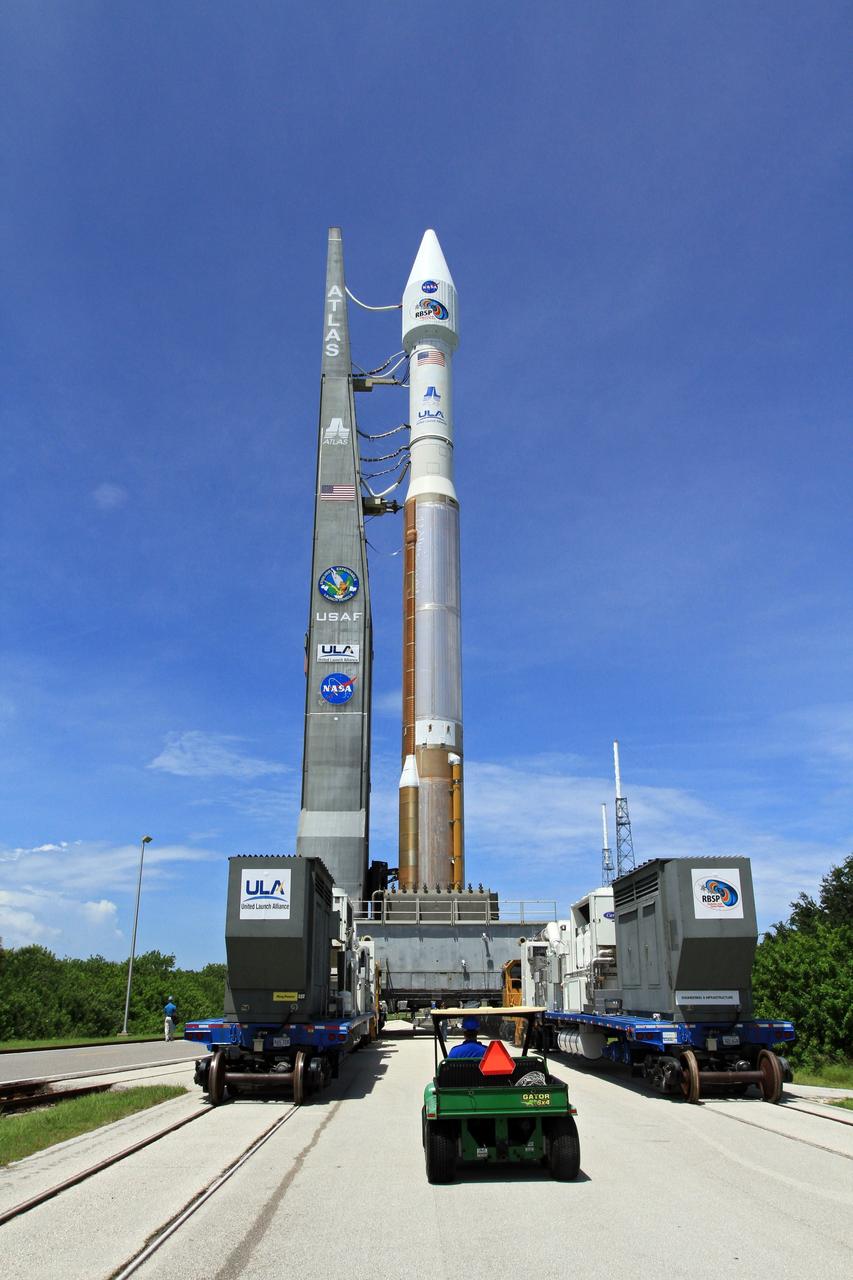 CAPE CANAVERAL, Fla. – At Cape Canaveral Air Force Station in Florida, the United Launch Alliance, or ULA, Atlas V rocket carrying NASA’s twin Radiation Belt Storm Probes, or RBSP, rolled out of the ULA Vertical Integration Facility at Space Launch Complex 41 at 1:59 p.m. EDT and is on its way to the launch pad. The Atlas V rocket had been rolled back to the facility on August 26 to ensure the launch vehicle and RBSP spacecraft were secured and protected from inclement weather caused by Tropical Storm Isaac.    RBSP will explore changes in Earth's space environment caused by the sun -- known as "space weather" -- that can disable satellites, create power-grid failures and disrupt GPS service. The mission also will provide data on the fundamental radiation and particle acceleration processes throughout the universe. The launch is rescheduled for 4:05 a.m. EDT on Aug. 30. For more information on RBSP, visit http://www.nasa.gov/rbsp.  Photo credit: NASA/Kim Shiflett