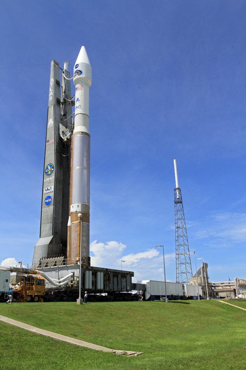 CAPE CANAVERAL, Fla. – At Cape Canaveral Air Force Station in Florida, the United Launch Alliance, or ULA, Atlas V rocket carrying NASA’s twin Radiation Belt Storm Probes, or RBSP, rolled out of the ULA Vertical Integration Facility at Space Launch Complex 41 at 1:59 p.m. EDT and is approaching the launch pad. The Atlas V rocket had been rolled back to the facility on August 26 to ensure the launch vehicle and RBSP spacecraft were secured and protected from inclement weather caused by Tropical Storm Isaac.    RBSP will explore changes in Earth's space environment caused by the sun -- known as "space weather" -- that can disable satellites, create power-grid failures and disrupt GPS service. The mission also will provide data on the fundamental radiation and particle acceleration processes throughout the universe. The launch is rescheduled for 4:05 a.m. EDT on Aug. 30. For more information on RBSP, visit http://www.nasa.gov/rbsp.  Photo credit: NASA/Kim Shiflett