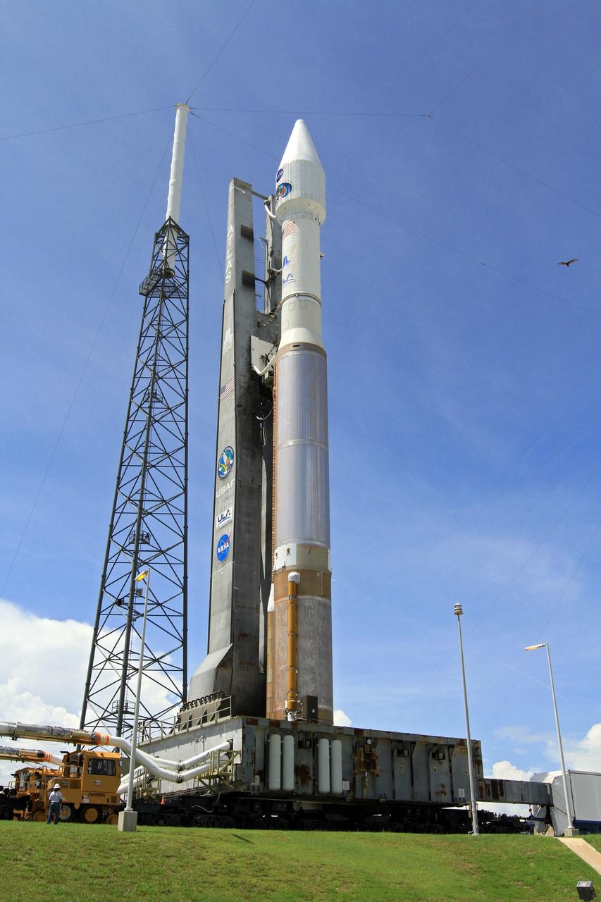 CAPE CANAVERAL, Fla. – At Cape Canaveral Air Force Station in Florida, the United Launch Alliance, or ULA, Atlas V rocket carrying NASA’s twin Radiation Belt Storm Probes, or RBSP, rolled out of the ULA Vertical Integration Facility at Space Launch Complex 41 at 1:59 p.m. EDT and is approaching the launch pad. The Atlas V rocket had been rolled back to the facility on August 26 to ensure the launch vehicle and RBSP spacecraft were secured and protected from inclement weather caused by Tropical Storm Isaac.    RBSP will explore changes in Earth's space environment caused by the sun -- known as "space weather" -- that can disable satellites, create power-grid failures and disrupt GPS service. The mission also will provide data on the fundamental radiation and particle acceleration processes throughout the universe. The launch is rescheduled for 4:05 a.m. EDT on Aug. 30. For more information on RBSP, visit http://www.nasa.gov/rbsp.  Photo credit: NASA/Kim Shiflett