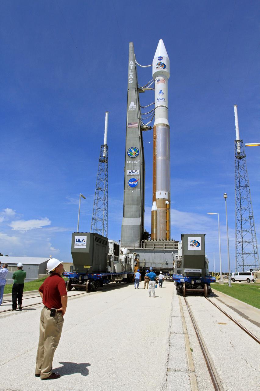 CAPE CANAVERAL, Fla. – At Cape Canaveral Air Force Station in Florida, the United Launch Alliance, or ULA, Atlas V rocket carrying NASA’s twin Radiation Belt Storm Probes, or RBSP, rolled out of the ULA Vertical Integration Facility at Space Launch Complex 41 at 1:59 p.m. EDT. ULA technicians monitor the progress as the rocket approaches the launch pad. The Atlas V rocket had been rolled back to the facility on August 26 to ensure the launch vehicle and RBSP spacecraft were secured and protected from inclement weather caused by Tropical Storm Isaac.    RBSP will explore changes in Earth's space environment caused by the sun -- known as "space weather" -- that can disable satellites, create power-grid failures and disrupt GPS service. The mission also will provide data on the fundamental radiation and particle acceleration processes throughout the universe. The launch is rescheduled for 4:05 a.m. EDT on Aug. 30. For more information on RBSP, visit http://www.nasa.gov/rbsp.  Photo credit: NASA/Kim Shiflett