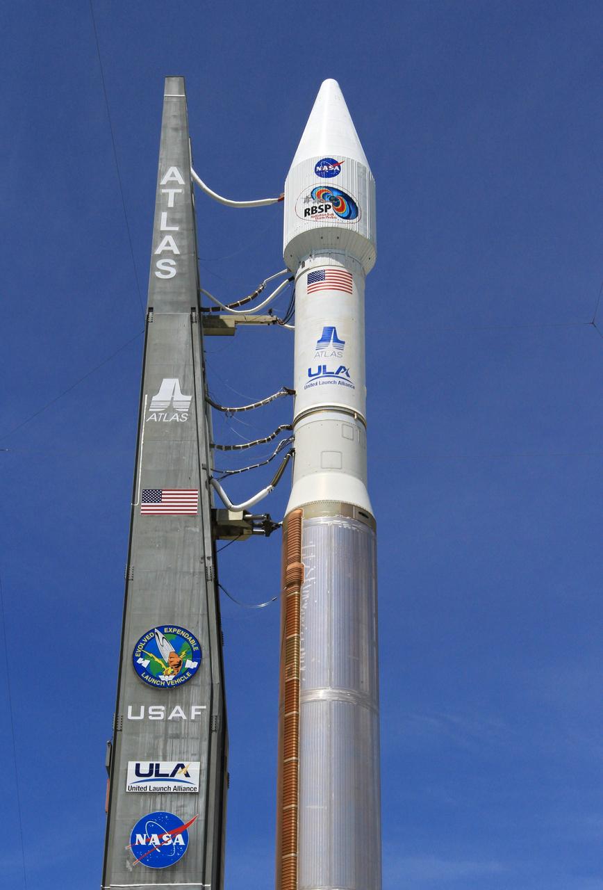 CAPE CANAVERAL, Fla. – At Cape Canaveral Air Force Station in Florida, the United Launch Alliance, or ULA, Atlas V rocket carrying NASA’s twin Radiation Belt Storm Probes, or RBSP, rolled out of the ULA Vertical Integration Facility at Space Launch Complex 41 at 1:59 p.m. EDT and is approaching the launch pad. The Atlas V rocket had been rolled back to the facility on August 26 to ensure the launch vehicle and RBSP spacecraft were secured and protected from inclement weather caused by Tropical Storm Isaac.    RBSP will explore changes in Earth's space environment caused by the sun -- known as "space weather" -- that can disable satellites, create power-grid failures and disrupt GPS service. The mission also will provide data on the fundamental radiation and particle acceleration processes throughout the universe. The launch is rescheduled for 4:05 a.m. EDT on Aug. 30. For more information on RBSP, visit http://www.nasa.gov/rbsp.  Photo credit: NASA/Kim Shiflett