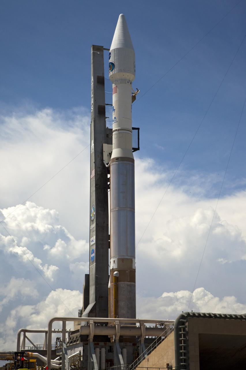 CAPE CANAVERAL, Fla. – At Cape Canaveral Air Force Station in Florida, the United Launch Alliance, or ULA, Atlas V rocket carrying NASA’s twin Radiation Belt Storm Probes, or RBSP, rolled out of the ULA Vertical Integration Facility at Space Launch Complex 41 at 1:59 p.m. EDT and has arrived at the launch pad. The Atlas V rocket had been rolled back to the facility on August 26 to ensure the launch vehicle and RBSP spacecraft were secured and protected from inclement weather caused by Tropical Storm Isaac.    RBSP will explore changes in Earth's space environment caused by the sun -- known as "space weather" -- that can disable satellites, create power-grid failures and disrupt GPS service. The mission also will provide data on the fundamental radiation and particle acceleration processes throughout the universe. The launch is rescheduled for 4:05 a.m. EDT on Aug. 30. For more information on RBSP, visit http://www.nasa.gov/rbsp.  Photo credit: NASA/Kim Shiflett