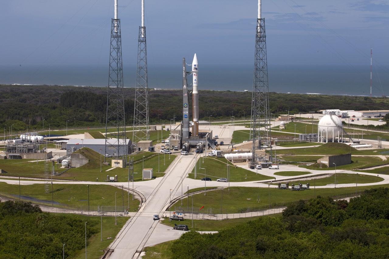CAPE CANAVERAL, Fla. – At Cape Canaveral Air Force Station in Florida, the United Launch Alliance, or ULA, Atlas V rocket carrying NASA’s twin Radiation Belt Storm Probes, or RBSP, rolled out of the ULA Vertical Integration Facility at Space Launch Complex 41 at 1:59 p.m. EDT and was fully secured in position on the pad at 2:57 p.m. The Atlas V rocket had been rolled back to the facility on August 26 to ensure the launch vehicle and RBSP spacecraft were secured and protected from inclement weather caused by Tropical Storm Isaac.    RBSP will explore changes in Earth's space environment caused by the sun -- known as "space weather" -- that can disable satellites, create power-grid failures and disrupt GPS service. The mission also will provide data on the fundamental radiation and particle acceleration processes throughout the universe. The launch is rescheduled for 4:05 a.m. EDT on Aug. 30, pending approval from the range.  For more information on RBSP, visit http://www.nasa.gov/rbsp.  Photo credit: NASA/Kim Shiflett