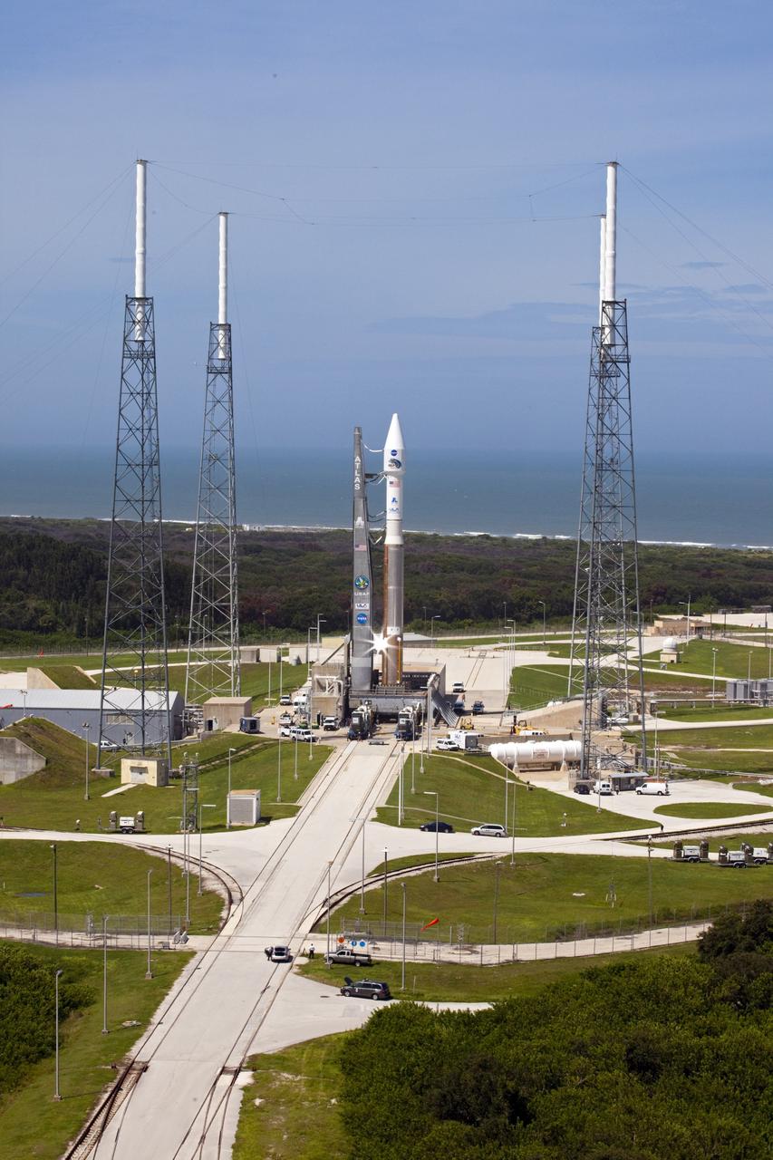 CAPE CANAVERAL, Fla. – At Cape Canaveral Air Force Station in Florida, the United Launch Alliance, or ULA, Atlas V rocket carrying NASA’s twin Radiation Belt Storm Probes, or RBSP, rolled out of the ULA Vertical Integration Facility at Space Launch Complex 41 at 1:59 p.m. EDT and was fully secured in position on the pad at 2:57 p.m. The Atlas V rocket had been rolled back to the facility on August 26 to ensure the launch vehicle and RBSP spacecraft were secured and protected from inclement weather caused by Tropical Storm Isaac.    RBSP will explore changes in Earth's space environment caused by the sun -- known as "space weather" -- that can disable satellites, create power-grid failures and disrupt GPS service. The mission also will provide data on the fundamental radiation and particle acceleration processes throughout the universe. The launch is rescheduled for 4:05 a.m. EDT on Aug. 30, pending approval from the range.  For more information on RBSP, visit http://www.nasa.gov/rbsp.  Photo credit: NASA/Kim Shiflett
