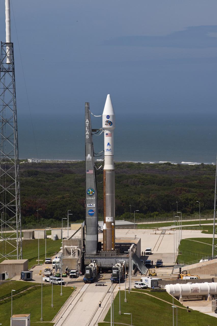 CAPE CANAVERAL, Fla. – At Cape Canaveral Air Force Station in Florida, the United Launch Alliance, or ULA, Atlas V rocket carrying NASA’s twin Radiation Belt Storm Probes, or RBSP, rolled out of the ULA Vertical Integration Facility at Space Launch Complex 41 at 1:59 p.m. EDT and was fully secured in position on the pad at 2:57 p.m. The Atlas V rocket had been rolled back to the facility on August 26 to ensure the launch vehicle and RBSP spacecraft were secured and protected from inclement weather caused by Tropical Storm Isaac.    RBSP will explore changes in Earth's space environment caused by the sun -- known as "space weather" -- that can disable satellites, create power-grid failures and disrupt GPS service. The mission also will provide data on the fundamental radiation and particle acceleration processes throughout the universe. The launch is rescheduled for 4:05 a.m. EDT on Aug. 30. For more information on RBSP, visit http://www.nasa.gov/rbsp.  Photo credit: NASA/Kim Shiflett