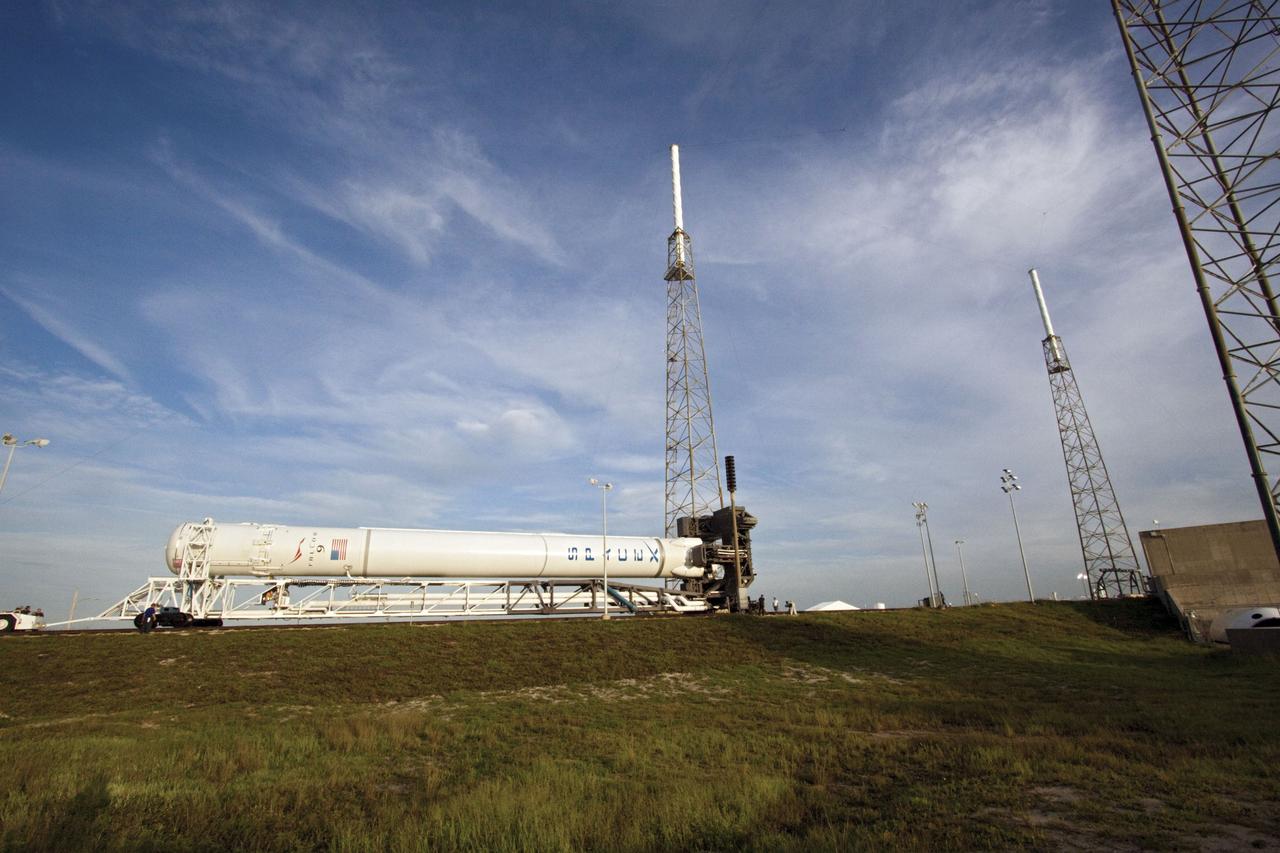 CAPE CANAVERAL, Fla. -- The Space Exploration Technologies, or SpaceX, Falcon 9 rocket rolls out of its processing hangar toward Space Launch Complex 40 at Cape Canaveral Air Force Station in Florida for a wet dress rehearsal. During the rehearsal, the rocket will be fully fueled and launch controllers will perform a countdown demonstration. The rehearsal is in preparation for the company's first Commercial Resupply Services, or CRS, mission to the International Space Station aboard the Dragon capsule.   The SpaceX CRS contract with NASA provides for 12 cargo resupply missions to the station through 2015, the first of which is targeted to launch in October 2012.SpaceX became the first private company to berth a spacecraft with the space station in 2012 during its final demonstration flight under the Commercial Orbital Transportation Services, or COTS, program managed by NASA's Johnson Space Center in Houston. Photo credit: NASA/Jim Grossmann