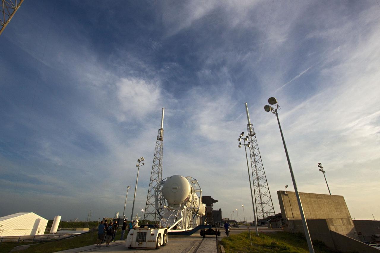 CAPE CANAVERAL, Fla. -- The Space Exploration Technologies, or SpaceX, Falcon 9 rocket rolls out of its processing hangar toward Space Launch Complex 40 at Cape Canaveral Air Force Station in Florida for a wet dress rehearsal. During the rehearsal, the rocket will be fully fueled and launch controllers will perform a countdown demonstration. The rehearsal is in preparation for the company's first Commercial Resupply Services, or CRS, mission to the International Space Station aboard the Dragon capsule.   The SpaceX CRS contract with NASA provides for 12 cargo resupply missions to the station through 2015, the first of which is targeted to launch in October 2012.SpaceX became the first private company to berth a spacecraft with the space station in 2012 during its final demonstration flight under the Commercial Orbital Transportation Services, or COTS, program managed by NASA's Johnson Space Center in Houston. Photo credit: NASA/Jim Grossmann