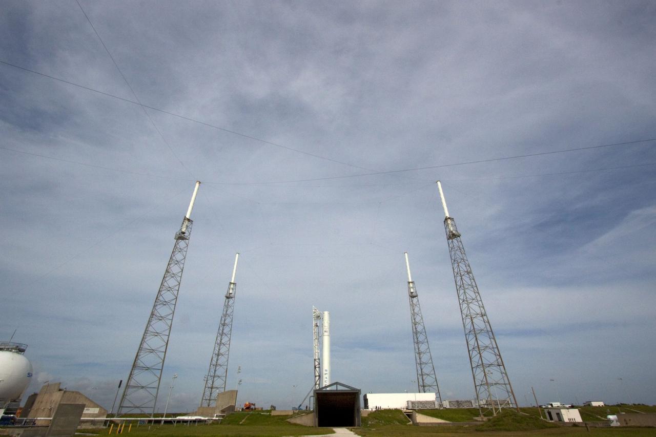 CAPE CANAVERAL, Fla. -- The Space Exploration Technologies, or SpaceX, Falcon 9 rocket is in position for a wet dress rehearsal at Space Launch Complex 40 at Cape Canaveral Air Force Station in Florida. During the rehearsal, the rocket will be fully fueled and launch controllers will perform a countdown demonstration. The rehearsal is in preparation for the company's first Commercial Resupply Services, or CRS, mission to the International Space Station aboard the Dragon capsule.   The SpaceX CRS contract with NASA provides for 12 cargo resupply missions to the station through 2015, the first of which is targeted to launch in October 2012.SpaceX became the first private company to berth a spacecraft with the space station in 2012 during its final demonstration flight under the Commercial Orbital Transportation Services, or COTS, program managed by NASA's Johnson Space Center in Houston. Photo credit: NASA/Jim Grossmann