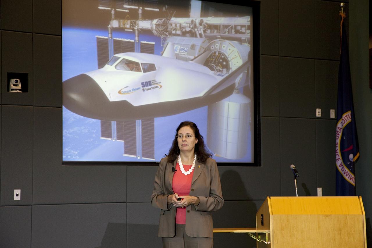 CAPE CANAVERAL, Fla. – Merri Sanchez of Sierra Nevada Corp. Space Systems speaks during the Kennedy Space Center's Innovation Expo in the Operations Support Building II. The center-wide event gave researchers a chance to show some of their work to others at the center and gave employees the opportunity to see facilities they hadn't viewed before. Photo credit: Gianni Woods