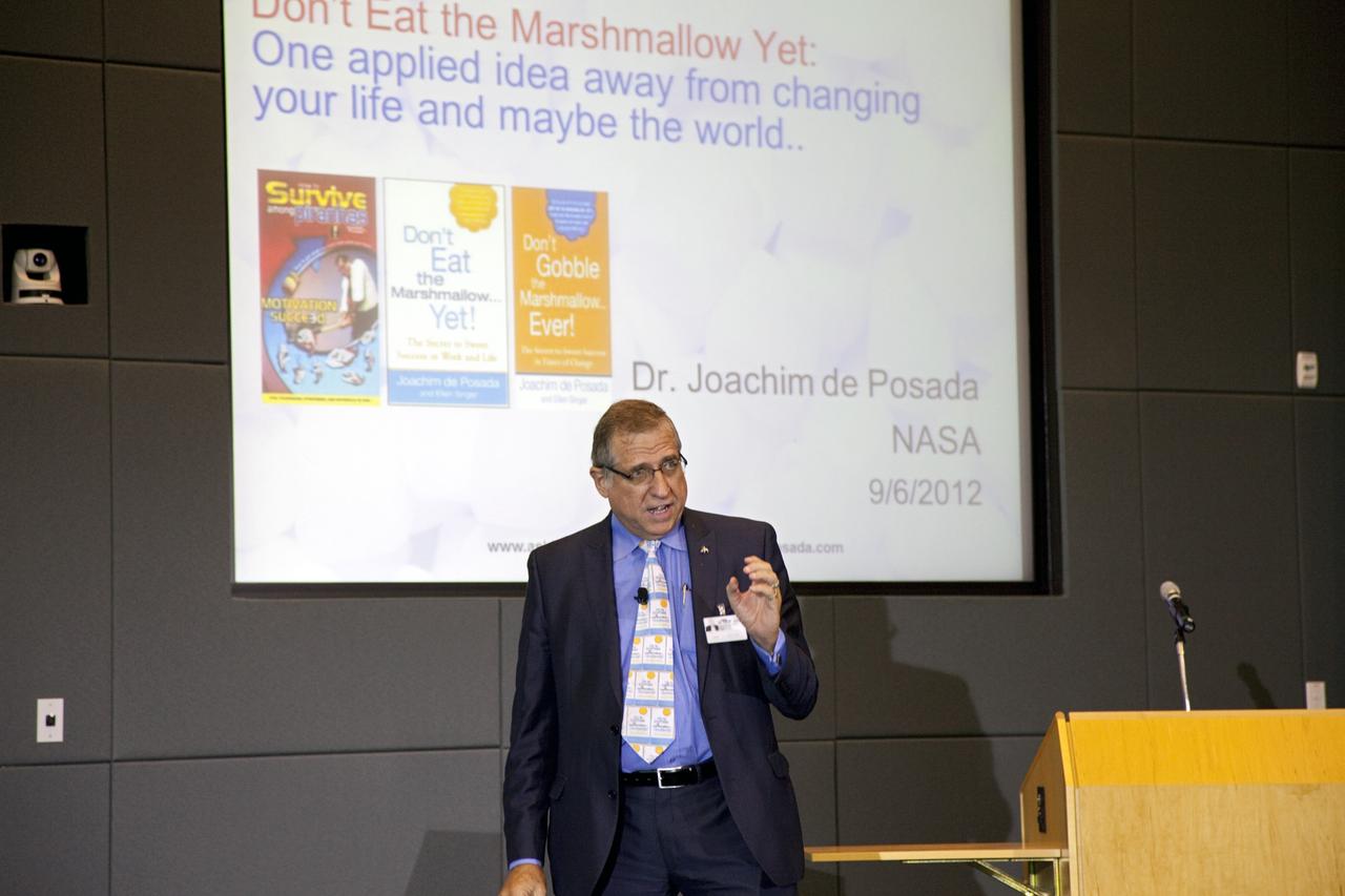 CAPE CANAVERAL, Fla. – NASA's Joachim de Posada speaks during the Kennedy Space Center's Innovation Expo in the Operations Support Building II. The center-wide event gave researchers a chance to show some of their work to others at the center and gave employees the opportunity to see facilities they hadn't viewed before. Photo credit: Gianni Woods