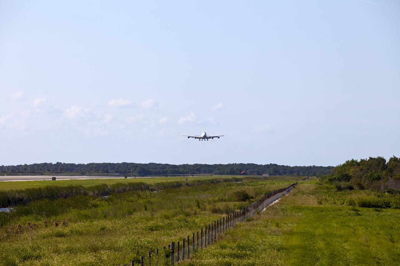 CAPE CANAVERAL, Fla. – The Shuttle Carrier Aircraft, or SCA, approaches the runway at NASA Kennedy Space Center’s Shuttle Landing Facility in Florida. The SCA touched down at 5:05 p.m. EDT to prepare for shuttle Endeavour’s ferry flight to the Los Angeles International Airport on Sept. 17.    This SCA, designated NASA 905, is a modified Boeing 747 jet airliner, originally manufactured for commercial use. One of two SCAs employed over the course of the Space Shuttle Program, NASA 905 is assigned to the final ferry mission. Endeavour will be placed on permanent public display at the California Science Center in Los Angeles. For more information on the SCA, visit http://www.nasa.gov/centers/dryden/news/FactSheets/FS-013-DFRC.html. For more information on shuttle transition and retirement activities, visit http://www.nasa.gov/shuttle.  Photo credit: NASA/Frankie Martin