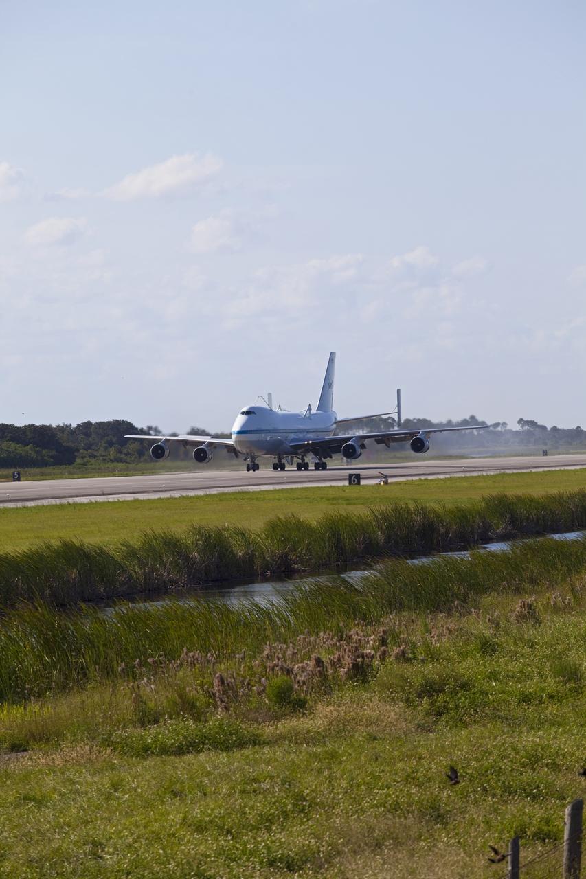 CAPE CANAVERAL, Fla. – The Shuttle Carrier Aircraft, or SCA, touched down at NASA Kennedy Space Center’s Shuttle Landing Facility in Florida at 5:05 p.m. EDT to prepare for shuttle Endeavour’s ferry flight to the Los Angeles International Airport on Sept. 17.    This SCA, designated NASA 905, is a modified Boeing 747 jet airliner, originally manufactured for commercial use. One of two SCAs employed over the course of the Space Shuttle Program, NASA 905 is assigned to the final ferry mission. Endeavour will be placed on permanent public display at the California Science Center in Los Angeles. For more information on the SCA, visit http://www.nasa.gov/centers/dryden/news/FactSheets/FS-013-DFRC.html. For more information on shuttle transition and retirement activities, visit http://www.nasa.gov/shuttle.  Photo credit: NASA/Frankie Martin