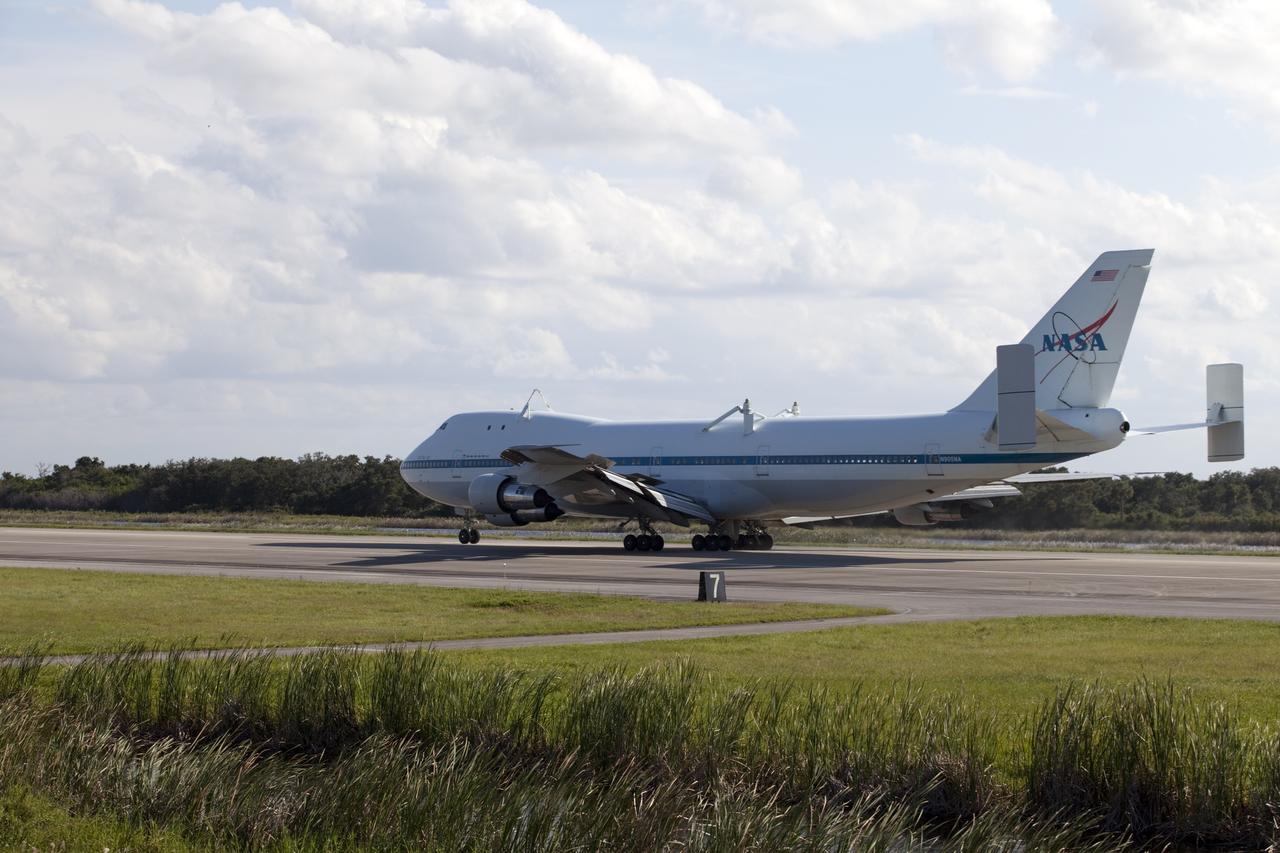 CAPE CANAVERAL, Fla. – The Shuttle Carrier Aircraft, or SCA, touched down at NASA Kennedy Space Center’s Shuttle Landing Facility in Florida at 5:05 p.m. EDT to prepare for shuttle Endeavour’s ferry flight to the Los Angeles International Airport on Sept. 17.    This SCA, designated NASA 905, is a modified Boeing 747 jet airliner, originally manufactured for commercial use. One of two SCAs employed over the course of the Space Shuttle Program, NASA 905 is assigned to the final ferry mission. Endeavour will be placed on permanent public display at the California Science Center in Los Angeles. For more information on the SCA, visit http://www.nasa.gov/centers/dryden/news/FactSheets/FS-013-DFRC.html. For more information on shuttle transition and retirement activities, visit http://www.nasa.gov/shuttle.  Photo credit: NASA/Frankie Martin