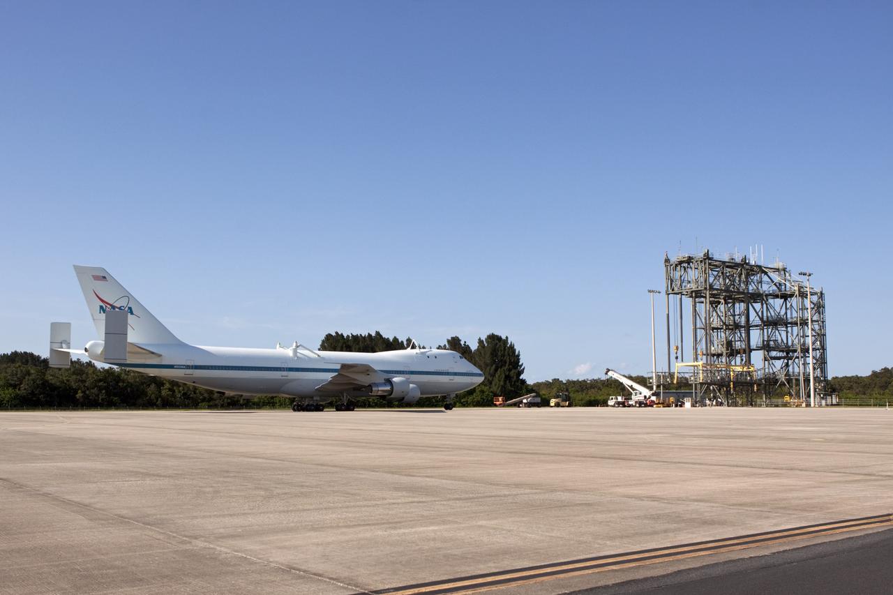 CAPE CANAVERAL, Fla. – The Shuttle Carrier Aircraft, or SCA, rolls onto the ramp area at NASA Kennedy Space Center’s Shuttle Landing Facility in Florida. The SCA touched down at 5:05 p.m. EDT to prepare for shuttle Endeavour’s ferry flight to the Los Angeles International Airport on Sept. 17. The Mate/Demate Device, or MDD, is located at the ramp area and will be used to hoist and lower Endeavour onto the back of the SCA. Photo credit: NASA/Jim Grossmann