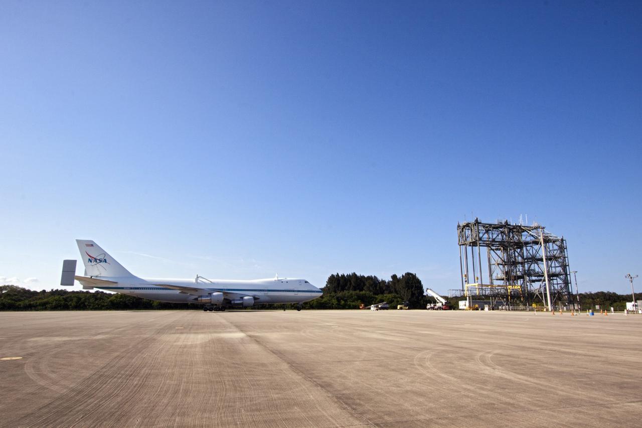 CAPE CANAVERAL, Fla. – The Shuttle Carrier Aircraft, or SCA, rolls onto the ramp area at NASA Kennedy Space Center’s Shuttle Landing Facility in Florida. The SCA touched down at 5:05 p.m. EDT to prepare for shuttle Endeavour’s ferry flight to the Los Angeles International Airport on Sept. 17. The Mate/Demate Device, or MDD, is located at the ramp area and will be used to hoist and lower Endeavour onto the back of the SCA. Photo credit: NASA/Jim Grossmann