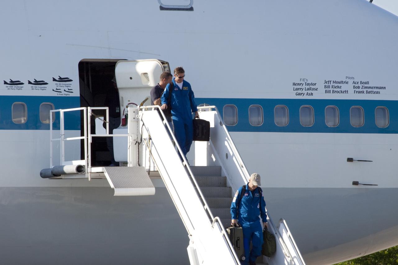 CAPE CANAVERAL, Fla. – Pilots and crew members leave the Shuttle Carrier Aircraft, or SCA, after it parked on the ramp area at NASA Kennedy Space Center’s Shuttle Landing Facility in Florida. The SCA touched down at 5:05 p.m. EDT to prepare for shuttle Endeavour’s ferry flight to the Los Angeles International Airport on Sept. 17. Photo credit: NASA/Jim Grossmann