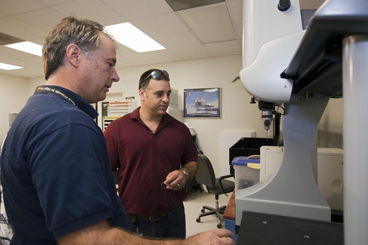 CAPE CANAVERAL, Fla. – At NASA’s Kennedy Space Center in Florida, a worker learns how new technologies enable future development at the Prototype Shop during the center’s 2012 Innovation Expo.    The center-wide event gave researchers a chance to show some of their work to others at the center and gave employees the opportunity to see facilities they hadn’t seen before. Photo credit: NASA/Kim Shiflett