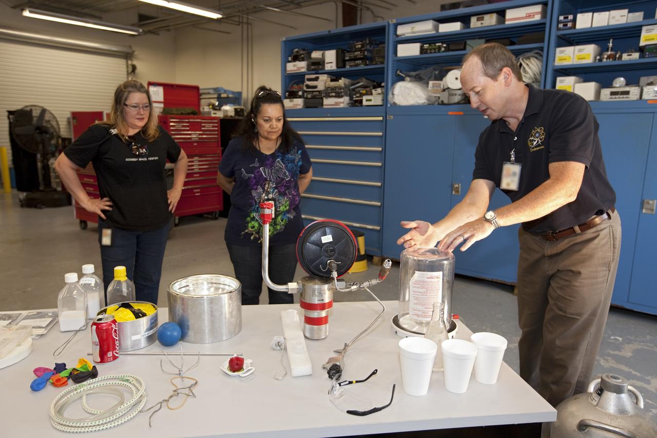 CAPE CANAVERAL, Fla. – At NASA’s Kennedy Space Center in Florida, workers learn about cryogenics in the Cryogenics Test Laboratory during the center’s 2012 Innovation Expo.    The center-wide event gave researchers a chance to show some of their work to others at the center and gave employees the opportunity to see facilities they hadn’t seen before. Photo credit: NASA/Kim Shiflett