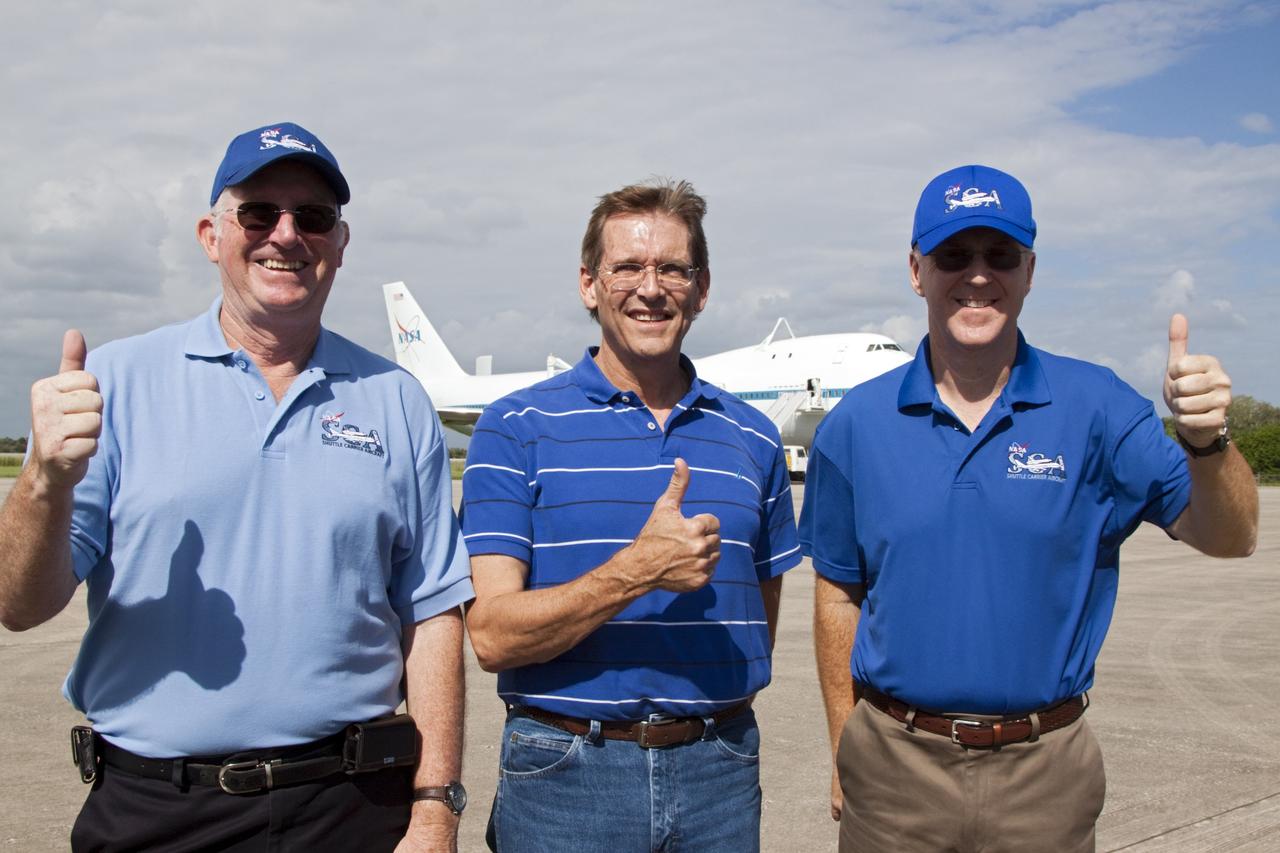 CAPE CANAVERAL, Fla. - Henry Taylor, from left to right, chief flight engineer on the Shuttle Carrier Aircraft, or SCA, Gary Ash, flight engineer, and Jeff Moultrie, pilot, look ahead to flying space shuttle Endeavour from NASA's Kennedy Space Center in Florida to Los Angeles for public display. Photo credit: NASA/Kim Shiflett