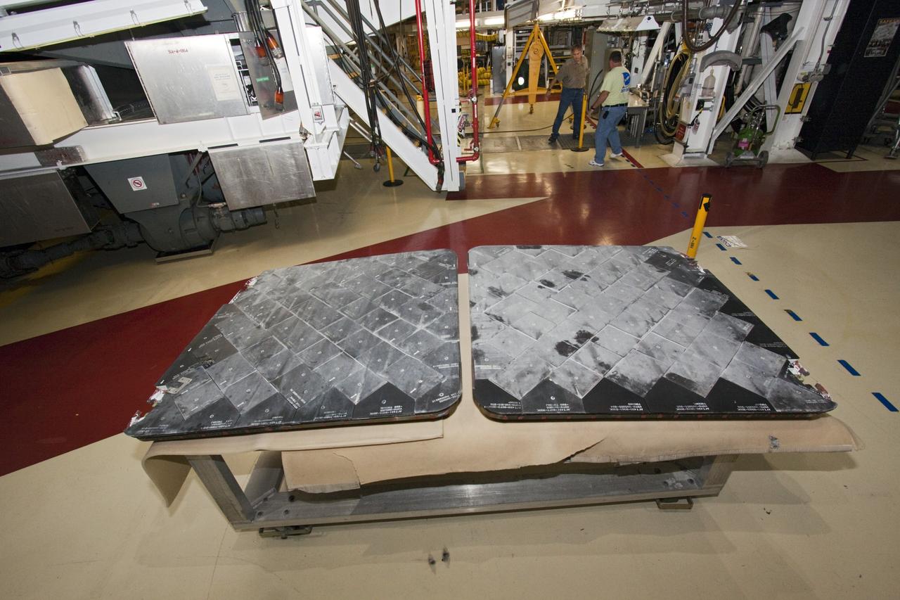CAPE CANAVERAL, Fla. – In Bay 2 of the Orbiter Processing Facility at NASA's Kennedy Space Center in Florida, two external fuel tank doors were removed from the space shuttle Atlantis. The orbiter is undergoing final preparations for its transfer to the Kennedy Space Center Visitor Complex targeted for November. The work is part of Transition and Retirement of the remaining space shuttles, Atlantis and Endeavour. Atlantis is being prepared for public display at Kennedy's Visitor Complex. Over the course of its 26-year career, Atlantis spent 293 days in space during 33 missions. For more information, visit http://www.nasa.gov/transition Photo credit: NASA/Jim Grossmann