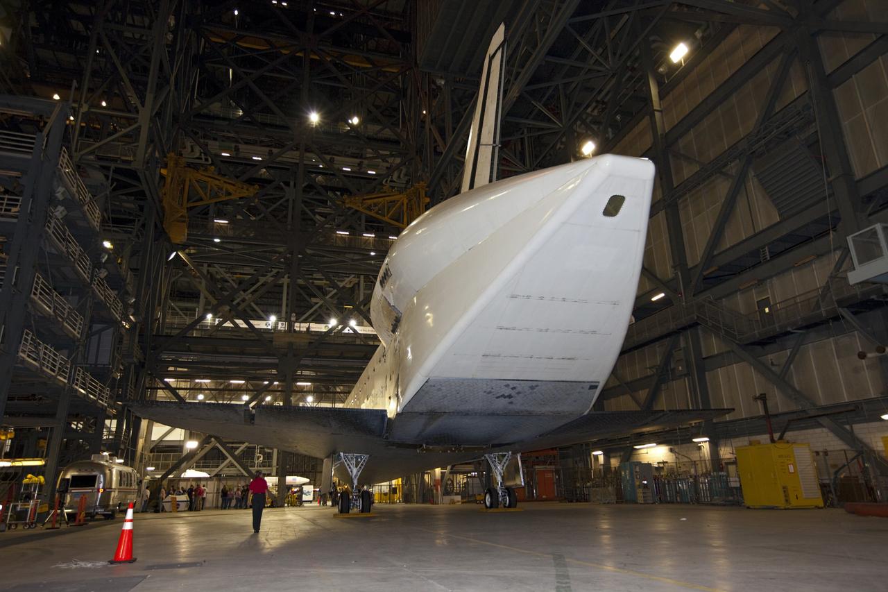 CAPE CANAVERAL, Fla. – An aerodynamic tail cone covers space shuttle Endeavour's trio of replica shuttle main engines as the spacecraft backs out of the Vehicle Assembly Building at NASA's Kennedy Space Center in Florida. Endeavour moved to the nearby Shuttle Landing Facility, where it will be lifted in the gantry-like Mate-Demate Device and placed atop NASA's modified 747 Shuttle Carrier Aircraft for the final ferry flight of the Space Shuttle Program. Endeavour will be placed on permanent public display at the California Science Center in Los Angeles. Photo credit: NASA/Kim Shiflett